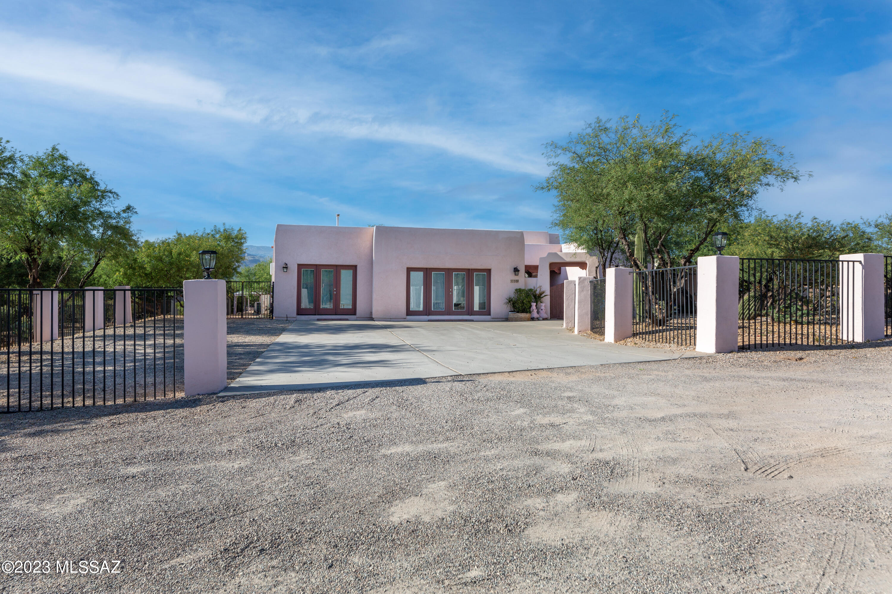 Dont Miss this Opportunity! Searles Adult Care Home nestled in the NE area of Tucson! This Spacious 4145 SF 10 BD/ 7BA Home with a Guest house and detached Studio has Gorgeous Mountain Views. Operating successfully for many years, this home boast all the luxuries and amenities you need. 
Enjoy the serene sounds of the waterfall that flows into the large Koi Pond with Catalina Mountain views under the ramada or covered patio. 
Spacious Bedrooms are Bright and Airy with Ceiling fans in each room. The Gourmet Kitchen is a Chefs Delight with granite counter tops and Stainless Steel appliances. The Dining and Kitchen opens into the great room. The split floor plan allows privacy. Two laundry rooms with washer and dryers. Guest house has 3 BD 3BA with outdoor patio sitting area. Studio has full bathroom & divided out for additional sleeping space or storage. Covered Carport for 2 Cars. Fenced property with security alarm, Surveillance cameras and high speed internet. Outdoor front landscape boasts beautiful flowers and various shrubs.  the Back yard has many natural desert plants and flowers. Full Package available for Searles Adult Care Home upon Request.