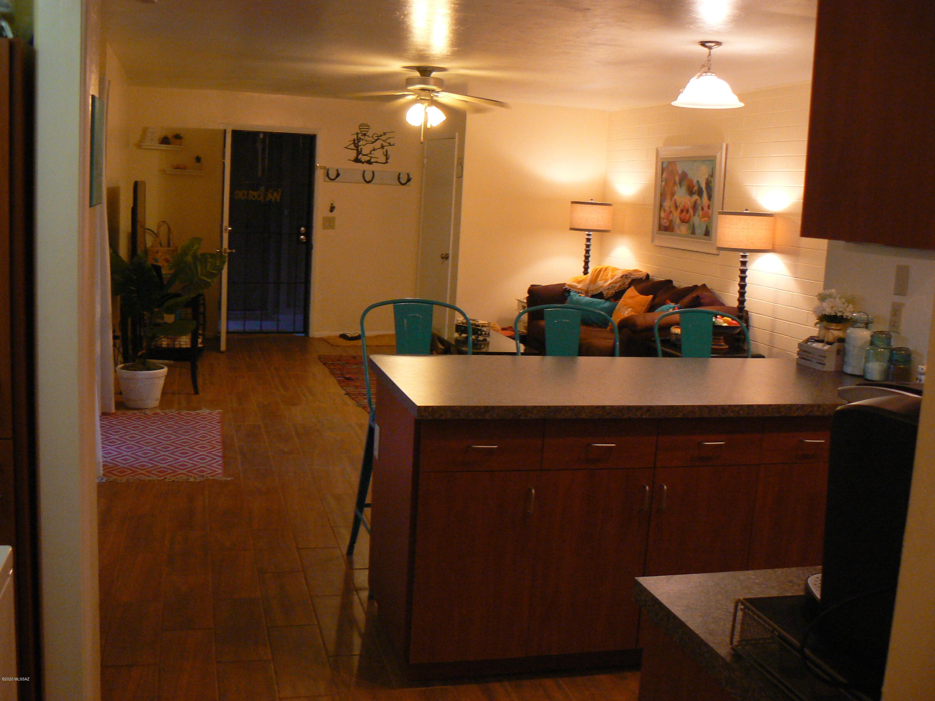 Conveniently located Gated Midtown Condo Complex. Very clean, move in ready 2bd/2 full baths, first floor unit that looks out over the fenced patio to the pool area. Present owner removed old tile and carpet and has replaced flooring with ceramic wood grained tile throughout the unit. They also repainted at that time to a more refreshing neutral color. All the Frigidaire appliances are an attractive matching set replaced in 2018. HOA includes water,sewer,trash, community pool, roof, building & grounds maintenance and a blanket insurance policy. A big plus is that it also includes heating and cooling for the unit from a master chiller/boiler. The only other utilities for the owner are cable and electric.