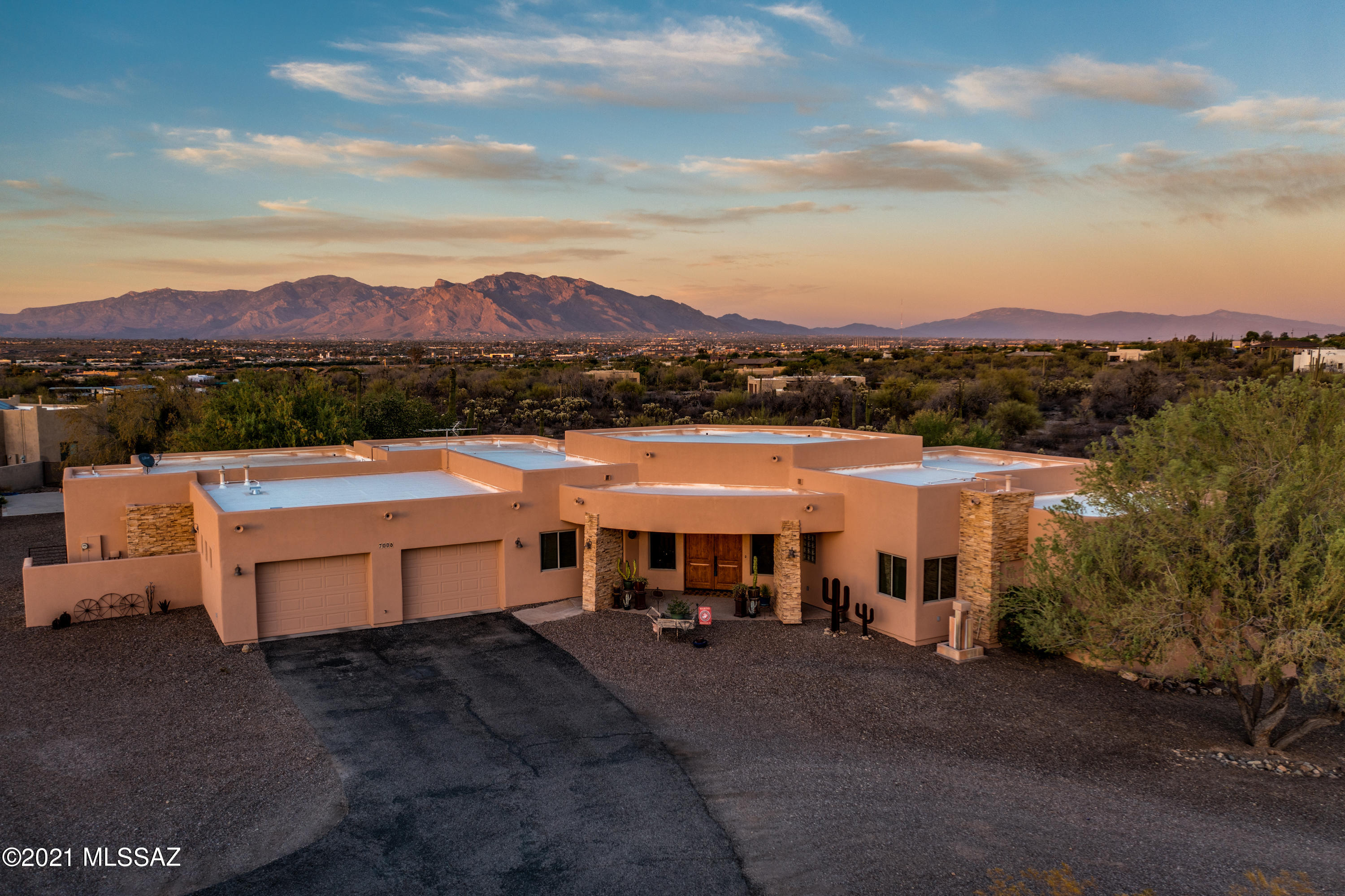 Wow!!! Stunning custom home on a beautiful 3.34 acre lot with panoramic views. Offering 4 bedrooms, 3 bathrooms, den and an office.   Living room boast a wall of windows overlooking resort like backyard, custom entertainment with built in TV. Engineered hardwood throughout.  Kitchen features granite counters, center island with prep sink, stainless steel appliances.  Split bedroom plan plan with large master bedroom, private patio entrance, en-suite bathroom with dual vanities, custom walk in shower, large walk in closet.  Entertainers backyard featuring, gas firepit, outdoor kitchen, pool, hot tub, multiple dining and sitting spaces. This is truly a must see home!