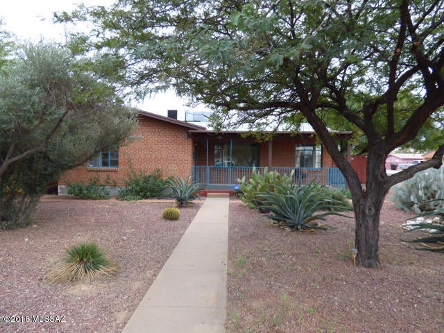 Main house has 3 bedrooms/2 baths. Ceramic tile throughout. Nice front and back porches. Close to UofA, shopping and restaurants. 
2bedroom/1bath Furnished Guest House rents separately for $795mo, has separate entrance and covered parking.
