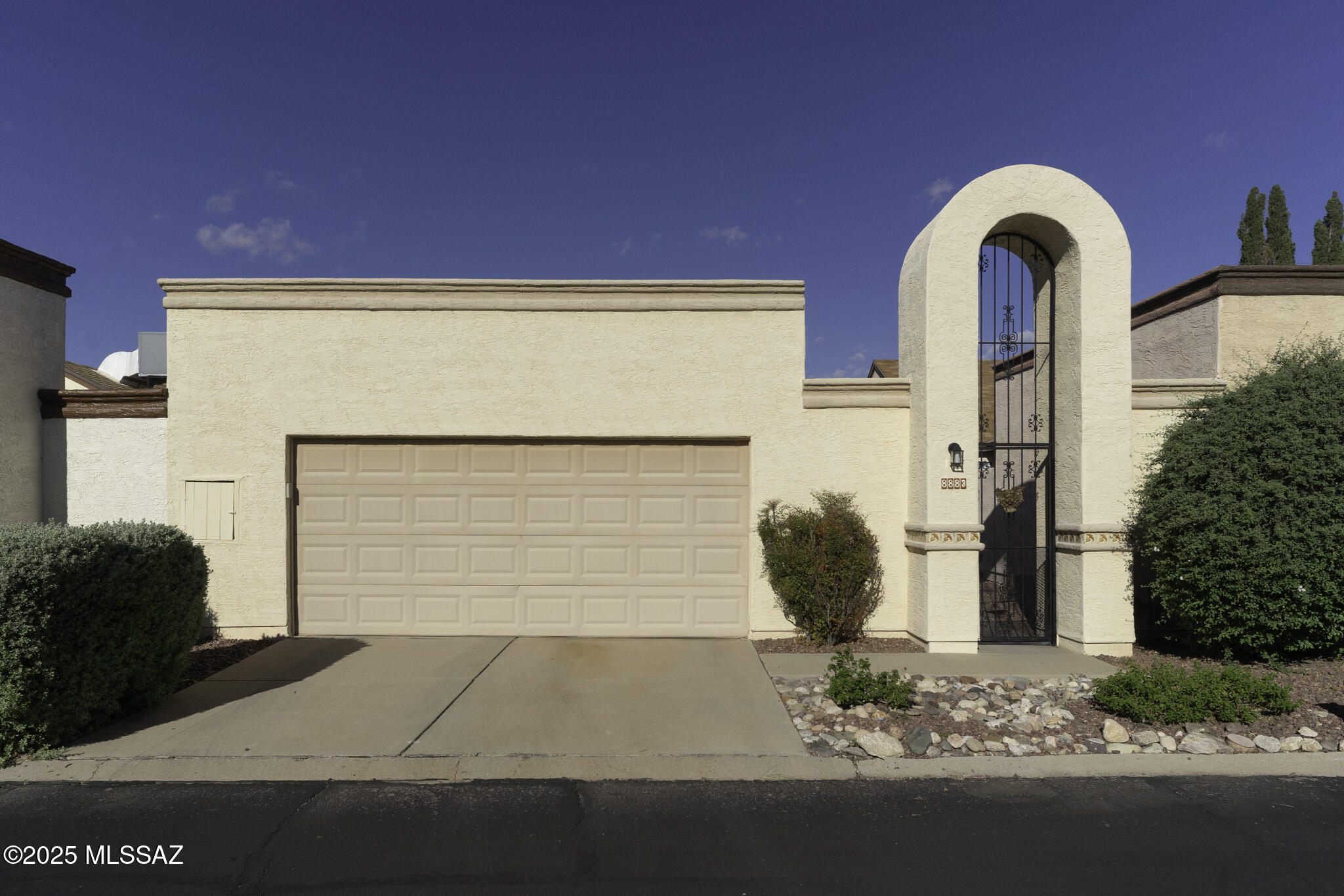 NEWLY PAINTED & MOVE-IN READY home offering 1,009 sq. ft. with tall vaulted ceilings, open floor plan, and well lit. Lots of windows and easy access into the outdoor space. UPDATED KITCHEN brings country-meets-modern with sleek stainless steel Samsung appliances installed in June 2024, copper-tone accents, and painted cabinetry. Both bedrooms feature private en-suite bathrooms, making it an ideal layout for guests or shared living. Enjoy Arizona evenings on the spacious covered patio. Two-car open garage includes extra storage. ADDITIONAL UPDATES include HVAC system replaced in 2022 with Ecobee smart thermostat and new black & rose gold washer with steam-cleaning dryer. Be sure to explore the Countryside Community Club featuring pool, spa, pickleball, and more. Home warranty included.