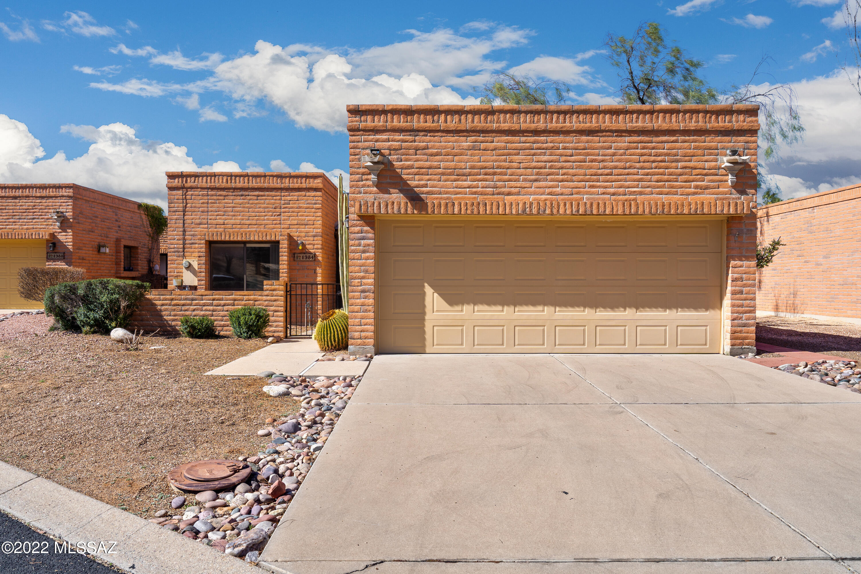 Located in 55+community of LaCholla Hills! 2 bedroom/2 bath with spacious kitchen & living area! Beautifully maintained, wall of storage cabinets in garage! Many community amenities to enjoy...2 pools and spas, tennis courts, clubhouse. Very close to The Loop for walking, biking! Convenient to I-10, shopping, dining, library, golf, hospital! Back patio with electric awning for shade. Roof 2015 and recent A/C and hot water heater.