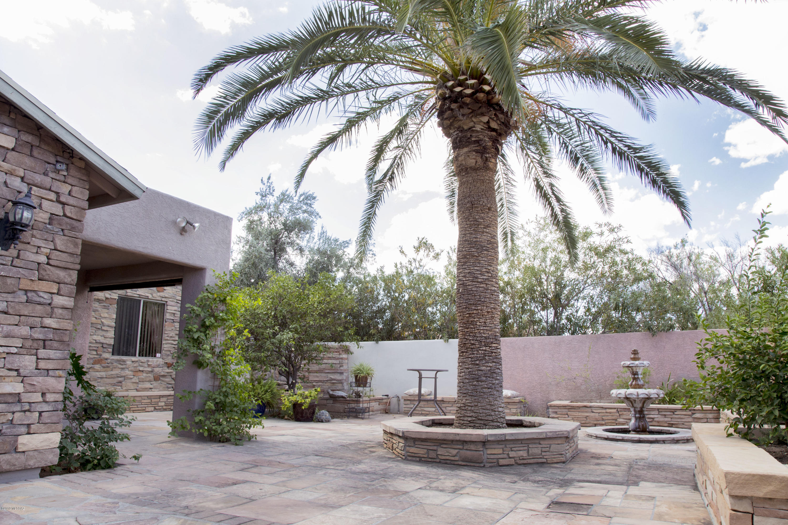 Spectacular home, centrally located in the heart of Tucson. This home is well maintained and move-in ready. As you enter, you will immediately feel the warmth and comfort of this home as the natural light shines through the kitchen. Continuing through the generously sized living room and dining room you will appreciate the floor plan this home has to offer. The large eat-in kitchen has tons of cabinet space and also features a breakfast bar. Master bedroom has walk in closet with access to the backyard. This home is conveniently located to schools, shopping and major highways. Come check out this beauty before its gone.