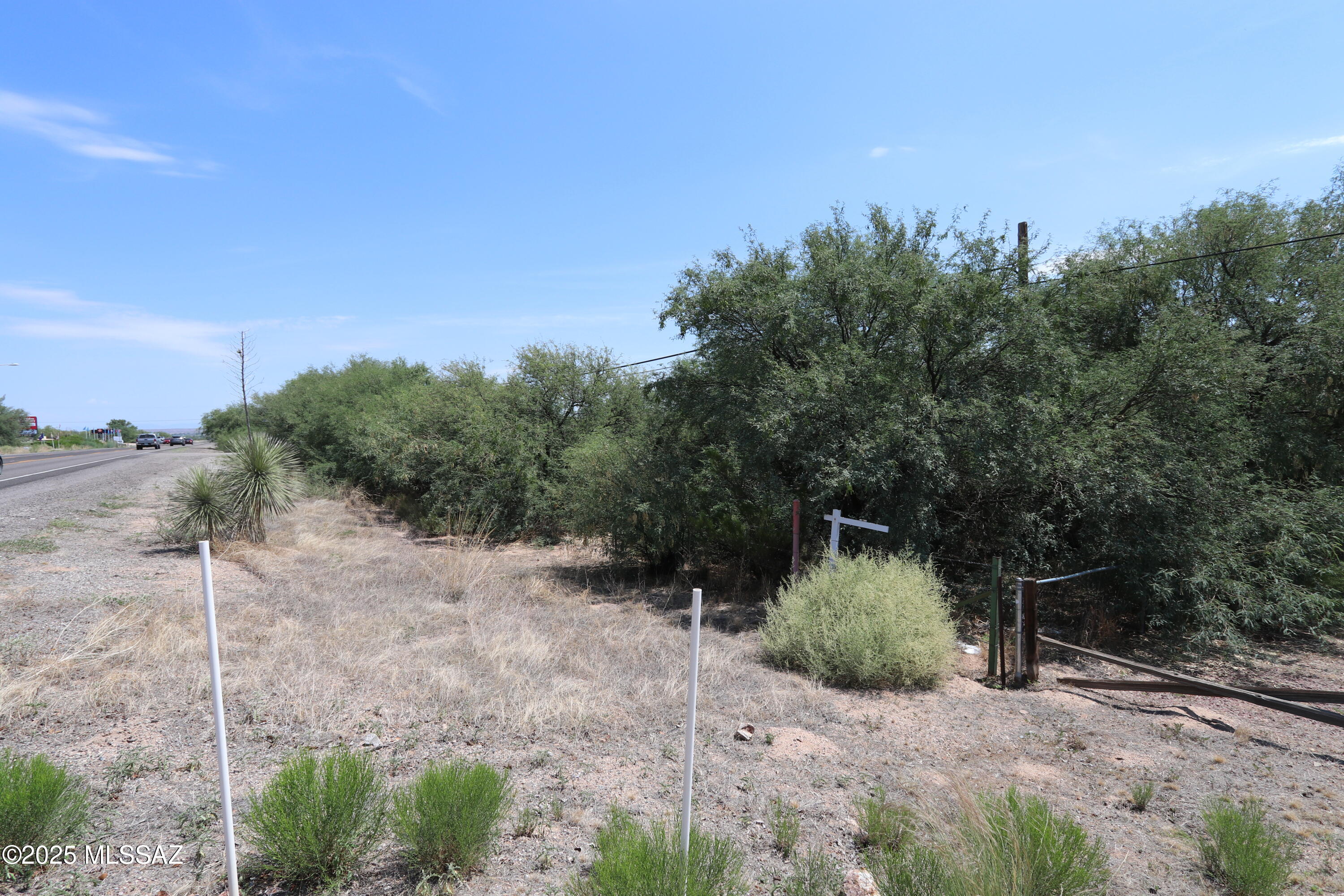 Seize the opportunity to own over 1 acre of zoned Benson AZ GB, strategically located on the bustling AZ Highway 80. With an impressive traffic count of 12,000 vehicles daily, this site promises exceptional visibility and access for your business. Surrounded by established neighbors including a veterinary clinic, auto body shop, convenience market/gas station, and RV parks, the location benefits from a steady flow of potential customers. Just 5 minutes from the heart of Benson, you'll find major amenities such as Safeway, Walmart, Tractor Supply, a hospital, and restaurants. City water and electric nearby, makes it simple to bring your vision to life. Plus, it is a 5-minute drive to Interstate 10, ensuring excellent connectivity for both local and regional traffic. 25 min to Tucson.