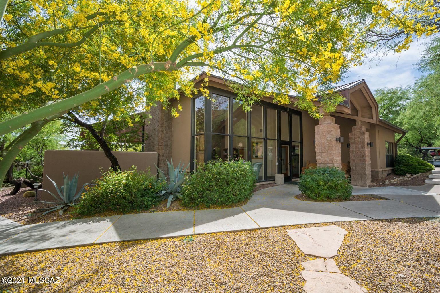 Enjoy resort living in the highly sought after Canyon View Condos in the foothills of the Catalina Mountains.  2nd floor unit. FULLY FURNISHED. Can be your second home or use as Airbnb/VRBO all year round. Split bedroom floor plan, built-in desk and shelves in guest bedroom, custom California closets,  granite counters in bathrooms screened porch. New Ac, water heater and dishwasher.  Resort style living near Ventana Canyon  & world class golf course . Amenities include 2 pools and spas, tennis courts, 2 clubhouses, exercise facility, & direct access to the Ventana Canyon Trail, one of Arizona's best right at your back door!  Close to shopping & restaurants.  Covered parking #20D.