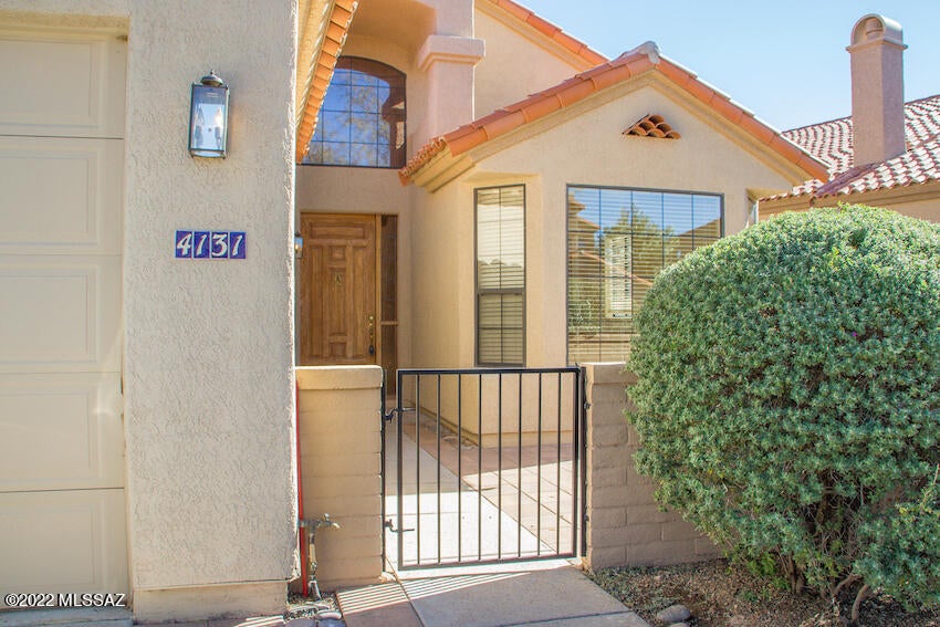 This magnificent 3 bedroom, 2 bathroom home is one you'll love to live in. From it's stunning fireplace centered in the living room to the lush desert landscaped backyard, you'll want to work from home! A cute front patio area takes you to your welcoming front door. The kitchen is nestled in the front of the home. Off the kitchen is your dining area with bay windows that looks out on your front patio. Your kitchen is full and bursting with cabinets. The two guest bedrooms are, to the left of the home, next to the shared bathroom and across from the laundry room which does include the washer and dryer. The master is located at the rear of the home with large open windows, a private door to the back patio, and a master bathroom with a walk-in closet. Once you see it you will fall in love! Unless otherwise requested by tenant put down to Blue Fox is an Equal Opportunity Housing Provider. We are also licensed Realtors