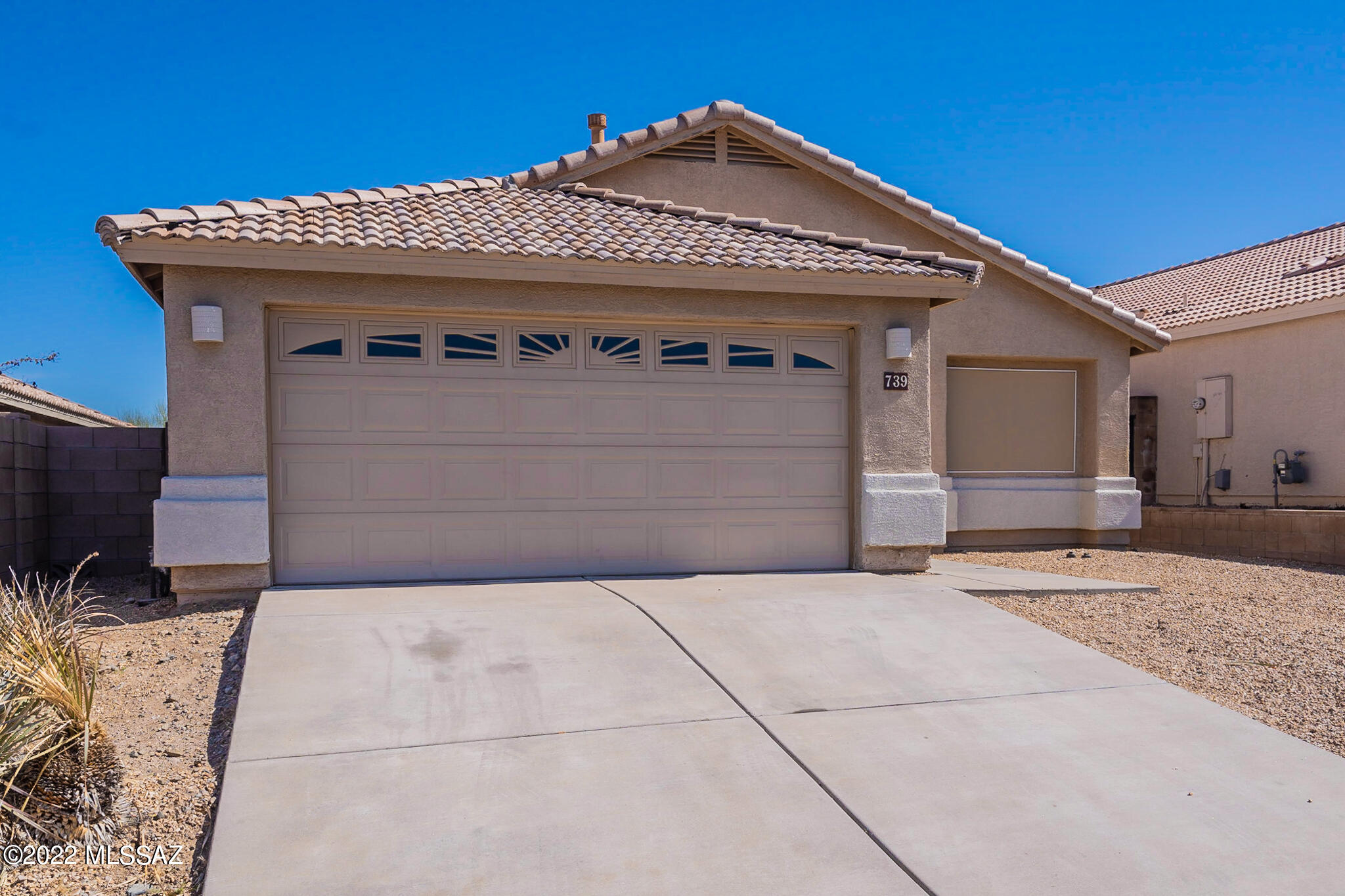 Beautiful 3Bd/2bath features formal Living/Dining combo plus Family room off Kitchen. Tile flooring through out. Bay window in Master suite w/garden tub, double sinks and walk-in closet. Vaulted ceilings with Ceiling fans through out. AC, 2 car garage. Low care back yard w/covered patio and sun screens.