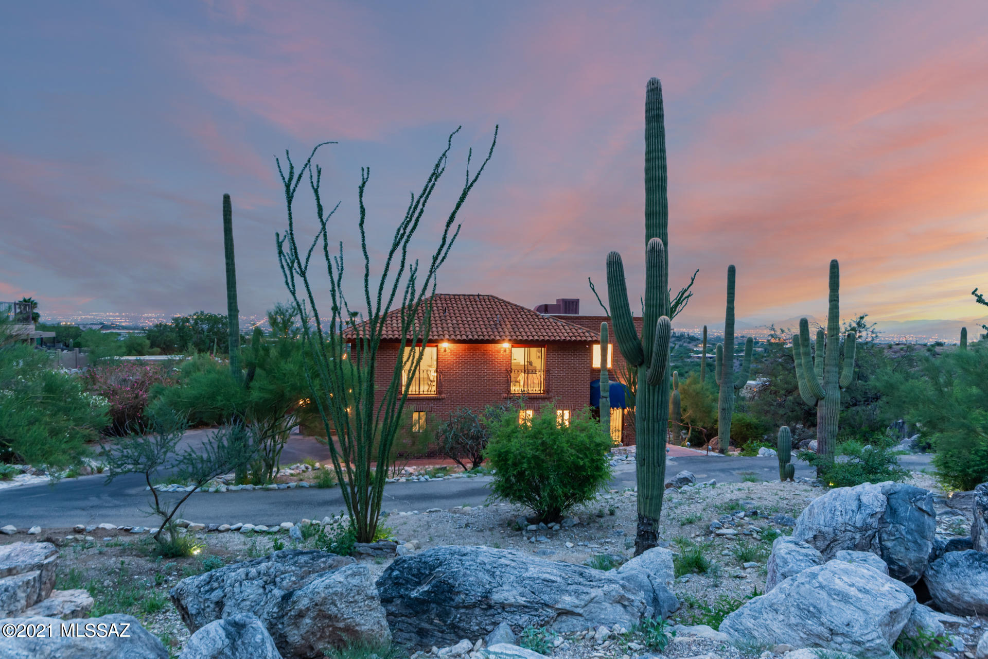 Sweeping views of the Catalinas and city surrounded by our stunning desert landscape and Saguaro cacti .  Relax by the pool and soak up the spectacular city views and picturesque Tucson sunsets in the privacy of your own back yard. These kind of views don't come around everyday so you won't want to miss this!
