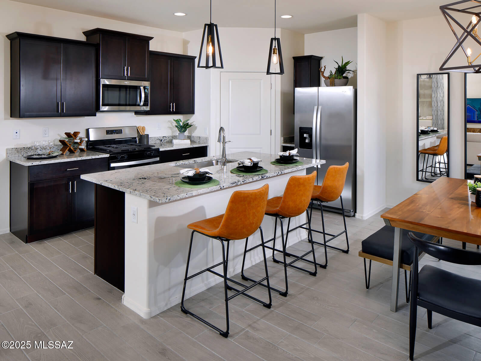 Brand new, spacious, energy efficient home with 4 bedrooms, 3 bathrooms, and a 2-car garage. Umber cabinets with dusty white and gray granite countertops, stone-look tile flooring and warm beige carpet in our Calm package. Visit Valencia Crossing and explore new homes for sale in Tucson, AZ. This community offers close proximity to major employment centers including Davis-Monthan Airforce Base and Tucson International Airport. Residents will enjoy a community park and convenient access to The Loop  Trail. Move-in ready with a washer, dryer, fridge, and whole-home blinds; closing in 60 days or less - guaranteed.