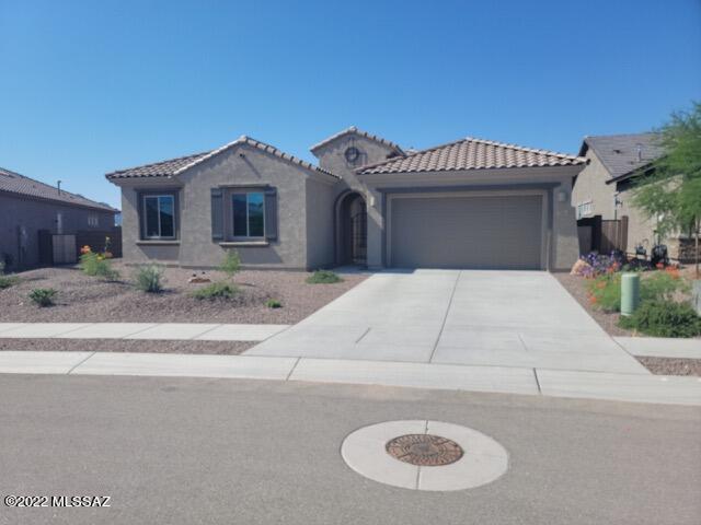 **MASSIVE PRICE REDUCTION**SELLER IS OFFERING $5000 CREDIT TOWARDS BUYER'S CLOSING COST OR TO BUY DOWN MORTGAGE INTEREST RATE.** Lovely Like new 4 bedroom, 2.5 bathroom house with open, airy floor plan. Situated in a desirable Oro Valley location, Rancho Vistoso Valley Vista is a lovely community with easy access to many amenities. This home boasts an office with French Doors, upgraded landscaping, a gated courtyard, upgraded bathrooms, upgraded plank tile, upgraded lighting, and upgraded kitchen cabinets and hardware. You're going to love this beautiful home!