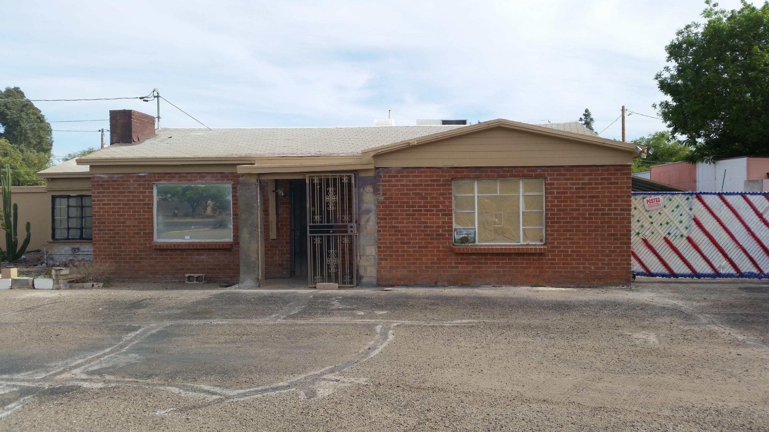 Great Location Wetmore Frontage. Solid double redbrick home office great Wetmore Exposure ready for someone who is creative and ambitious can make a great home/office or more with MU zoning Corner lot advantage.