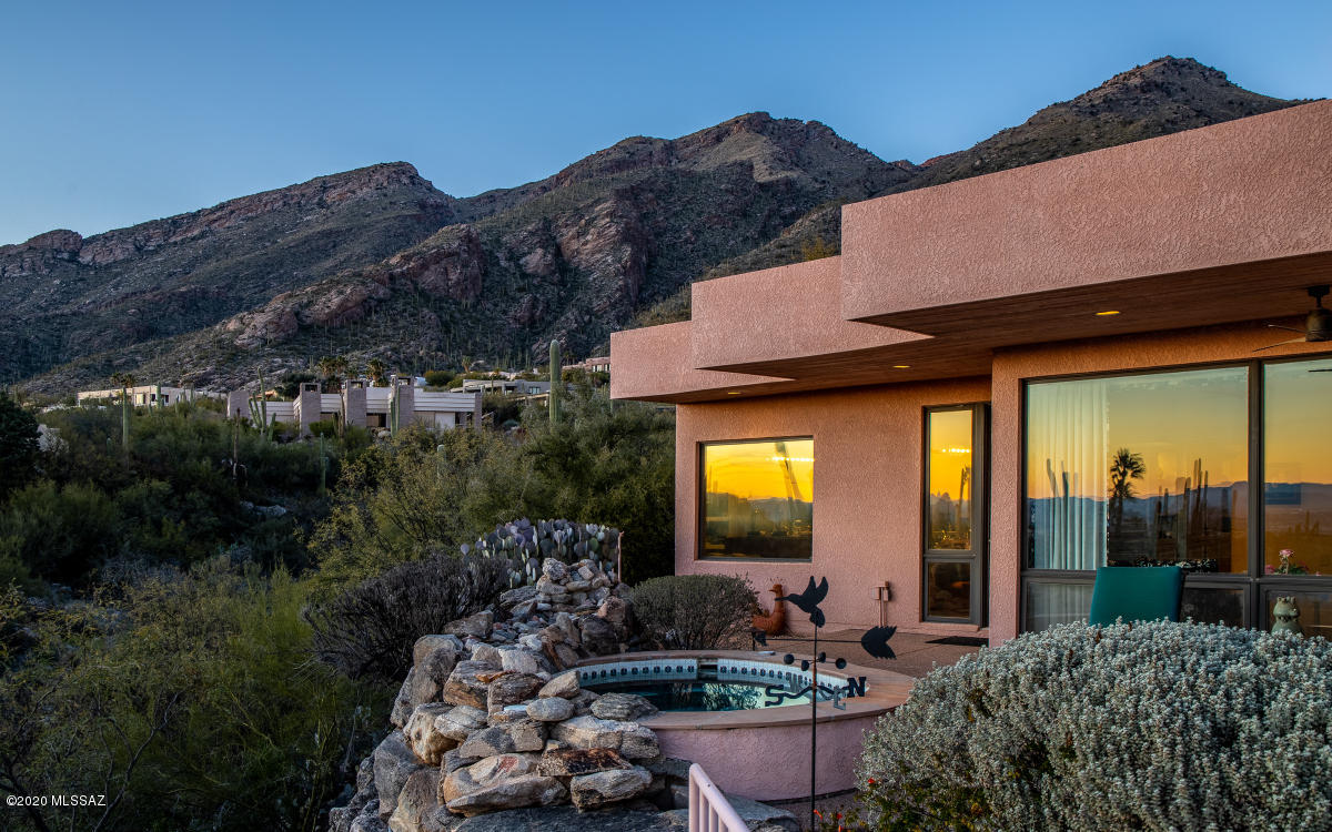 Walk toward the front door of this Campisano designed home and be prepared to have your breath taken away:  Views, Views, Views from Windows, Windows, Windows!! The palatial great room features dramatic high ceilings, walls of glass to capture valley & mtn views, fireplace, & expansive dining area. Lots of room for a grand piano & more. Island kitchen: Subzero refrigerator, gas cook top, double ovens incl convection, wine cooler,  warming drawer,  prep sink, banquette breakfast area & deep walk-in pantry. Luxurious owners' suite: grandly proportioned w/ patio access & spectacular views, elegant bath suite complete w/ steam shower, jetted tub, & spacious closet w/ lots of built-ins. BR 2 (currently an office) has adjacent bath.  CONTACT MADELINE FOR PERSONAL LIVE DIGITAL TOUR.