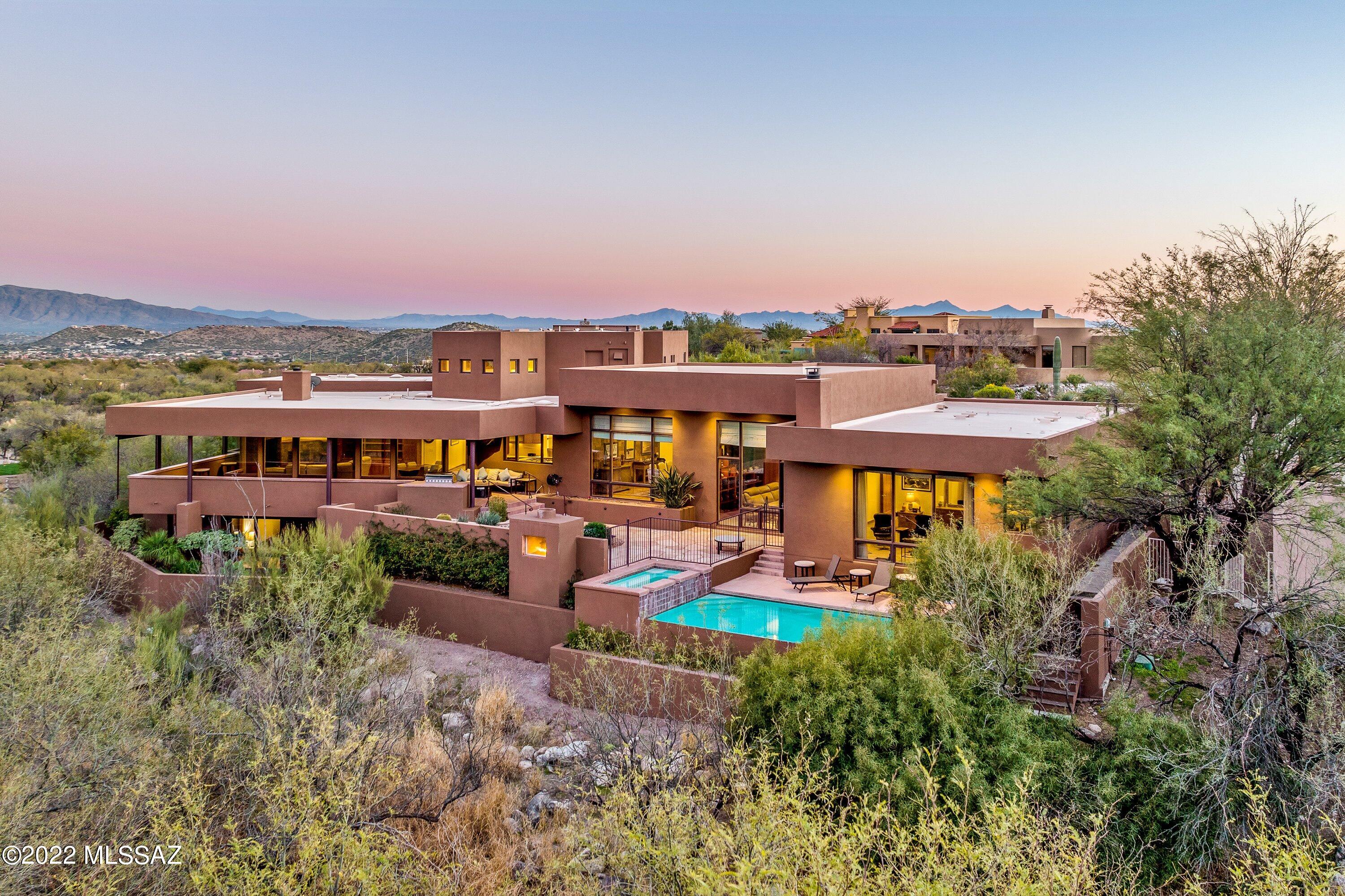 Spectacular Custom Contemporary in prestigious gated Ventana Canyon. Offering sweeping golf course, Mountain and Canyon views. Newly renovated one of a kind with highest quality throughout.  Chef's kitchen with cherry cabinets, high-end appliances, warming drawer, two dishwashers. Large walk-in pantry with dual wine coolers. Large media room. Indoor basketball court. There are limitless uses for the gym including a fitness room, dance studio or artist studio.   Exceptionally large Exquisite primary suite with fireplace, his and her baths with walk-in closets. All other bedrooms are substantial in size.  His/her office with built-in desks, grand bookshelves and alcove with daybed.  Beyond the glass soak in the captivating mountain and golf course views from your sprawling patio and pool. This home is made for entertaining and everyday living. Truly a masterpiece!