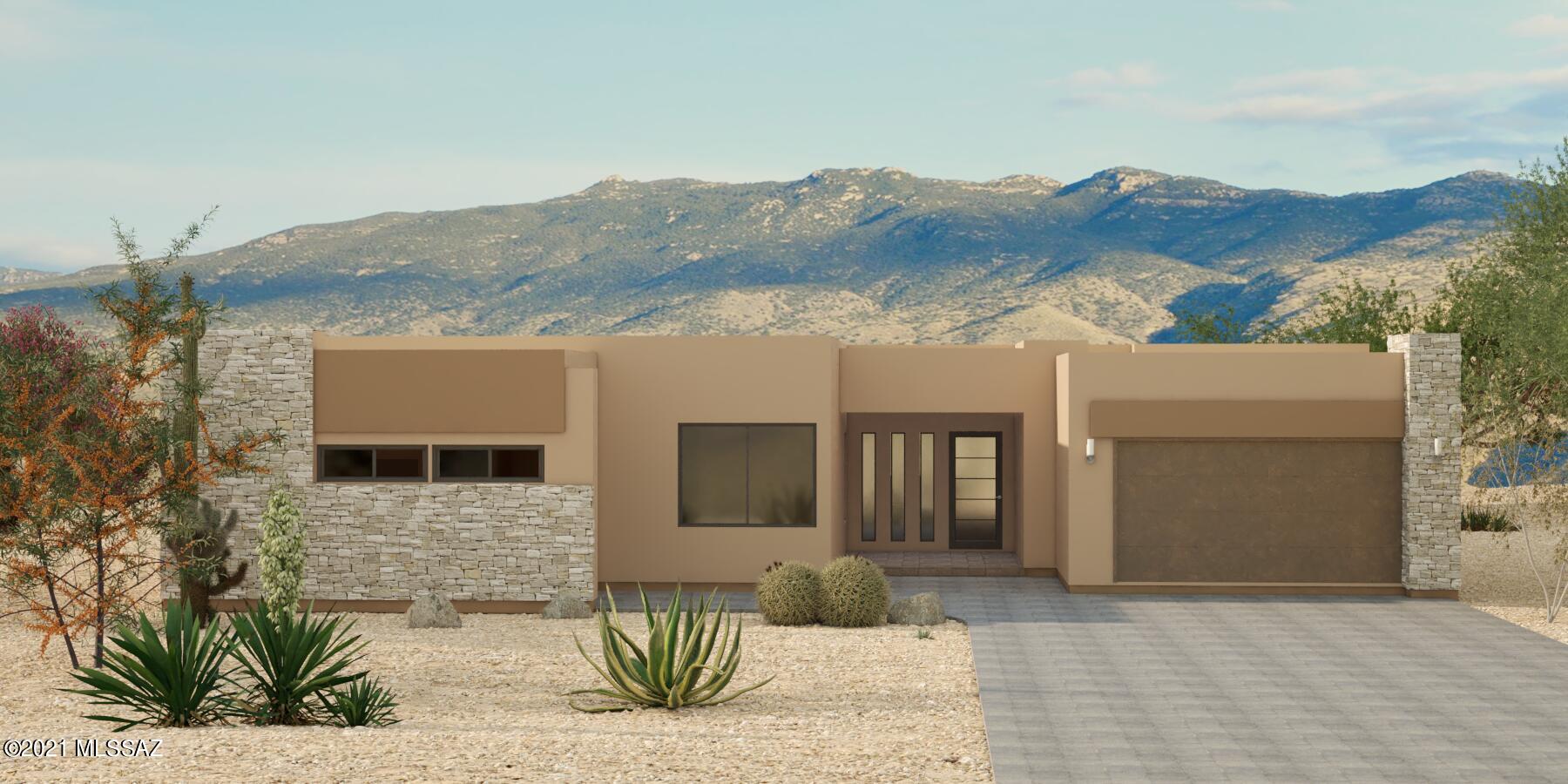 This stunning Manzanita home has unbeatable Catalina Mountain views! Enjoy your privacy with a natural greenbelt right outside
your backyard! A gourmet kitchen looks out to the mountain view and your large covered patio makes entertaining a delight! Each
bedroom has it's own luxury on-suite attached to it and your owner's bathroom features a large soaking tub and walk in shower. Some
of our most popular features are included in this home including a fireplace, an office and a flex space, cultured stone exterior accents
and rustic garage doors (with space for 3 vehicles!) Our in house design team has made intentional design choices for this home and
the list price includes interior design choices. Move in ready early spring 2022! Base price is subject to change based on building
mater