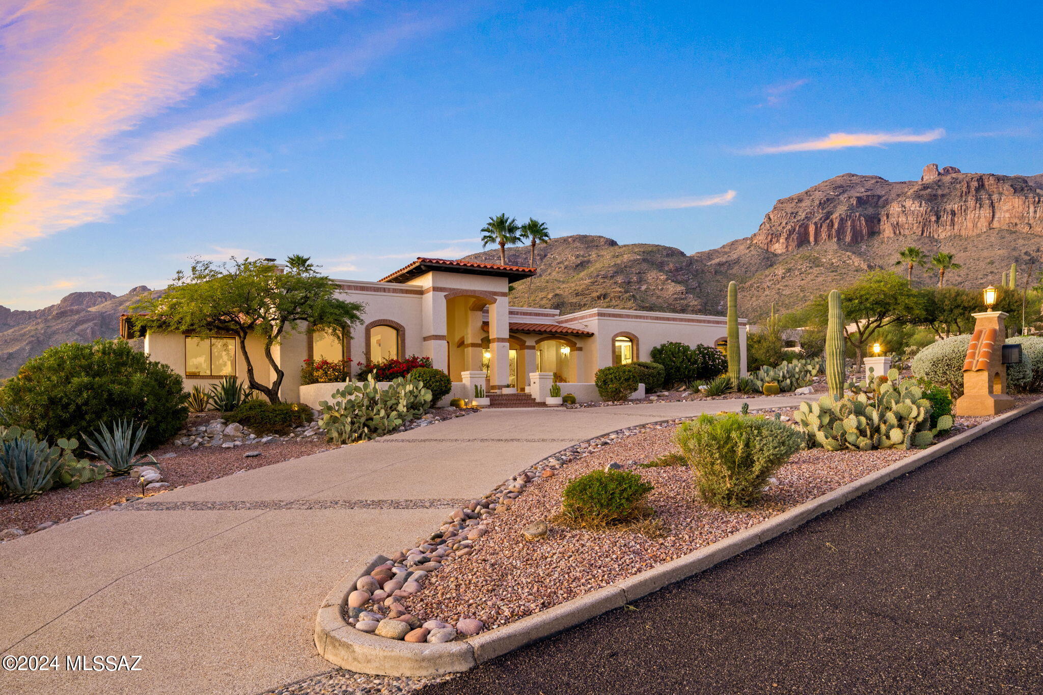 Discover Your Dream Home in the Heart of Cobblestone!

Welcome to this exquisite four-bedroom, five-bathroom masonry masterpiece, nestled in the prestigious Cobblestone Community, bordered by the breathtaking Catalina Foothills. This architectural gem offers a perfect blend of luxury and comfort, featuring stunning city and mountain views that can be admired from every living space.

Step inside to find an expansive open floor plan, accentuated by beautiful exposed wood beam ceilings that add warmth and character throughout the home. The gourmet kitchen, equipped with top-of-the-line appliances and generous counter space, seamlessly flows into the inviting living and dining areas ideal for entertaining or cozy family gatherings. Retreat to the spacious primary suite, where you can wake up to panoramic views and unwind in the lavish en-suite bathroom complete with a soaking tub and dual vanities. Each additional bedroom is thoughtfully designed, providing guests and family members with their own private sanctuary.

Outside, the meticulously landscaped yard is a true oasis, featuring a sparkling pool and spa perfect for relaxation and entertaining. Enjoy al fresco dining under the stars or bask in the Arizona sun, all while taking in the stunning mountain backdrop. With easy access to hiking trails, upscale shopping, and dining options, this home combines tranquility with convenience in a secure, gated environment.

Don't miss your chance to own this slice of paradise in the heart of Cobblestone. Schedule your private tour today and experience the beauty of city living against a backdrop of majestic mountains!