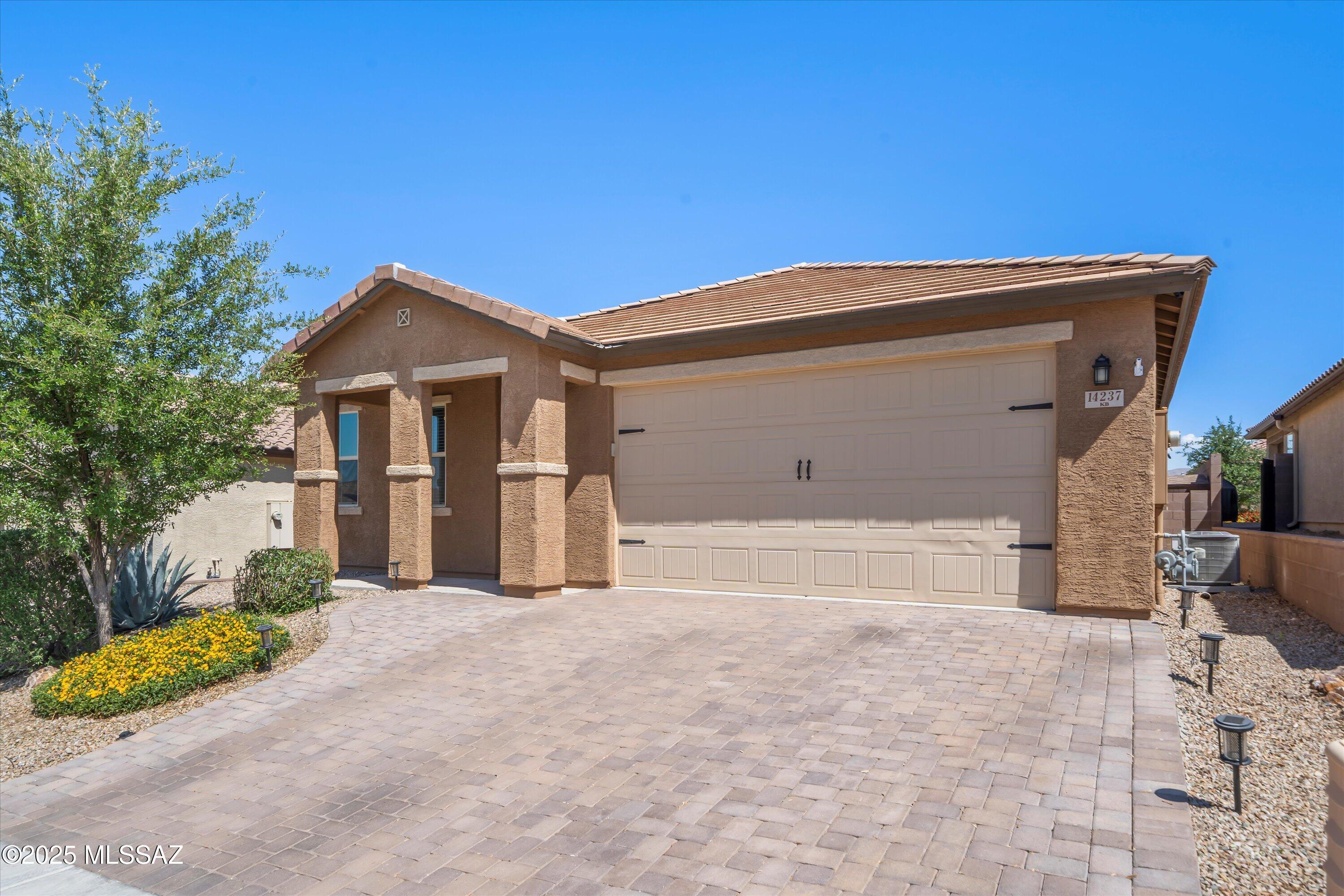 This 3-bedroom, 2-bath home in the Rancho del Lago community has a smart, open layout with a bonus room that's perfect for a home office or playroom. Built in 2019, it offers 1,708 sq ft and sits in the highly rated Vail School District.

The kitchen and main living area flow nicely, making it easy to entertain or just hang out. Out back, the yard is finished with artificial turf and pavers—low maintenance and ready to enjoy. Rancho del Lago also features a public golf course and restaurant just down the road.

Move-in ready and priced to sell—don't miss it!