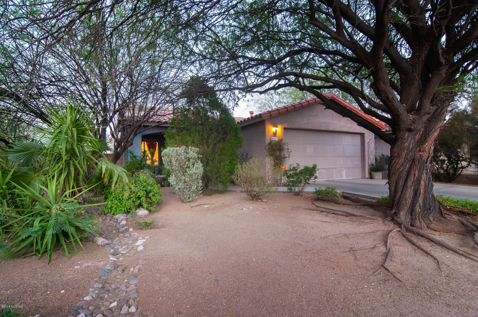 Modern construction and floorplan in the center of the Old Pueblo!  Beautiful 3 bedroom, 2 bath home in established mid-town neighborhood.  Walk-in closet! 2 car enclosed garage approx. 20'X19'!  Kitchen island and soaring, 10 foot ceilings.  Great room with fire place and separate living room. Ice cold AC. Dual pane windows. large landscaped backyard. walking distance to whole foods, Starbux, The Loft Theater and all that Central Tucson has to offer!  Come see!