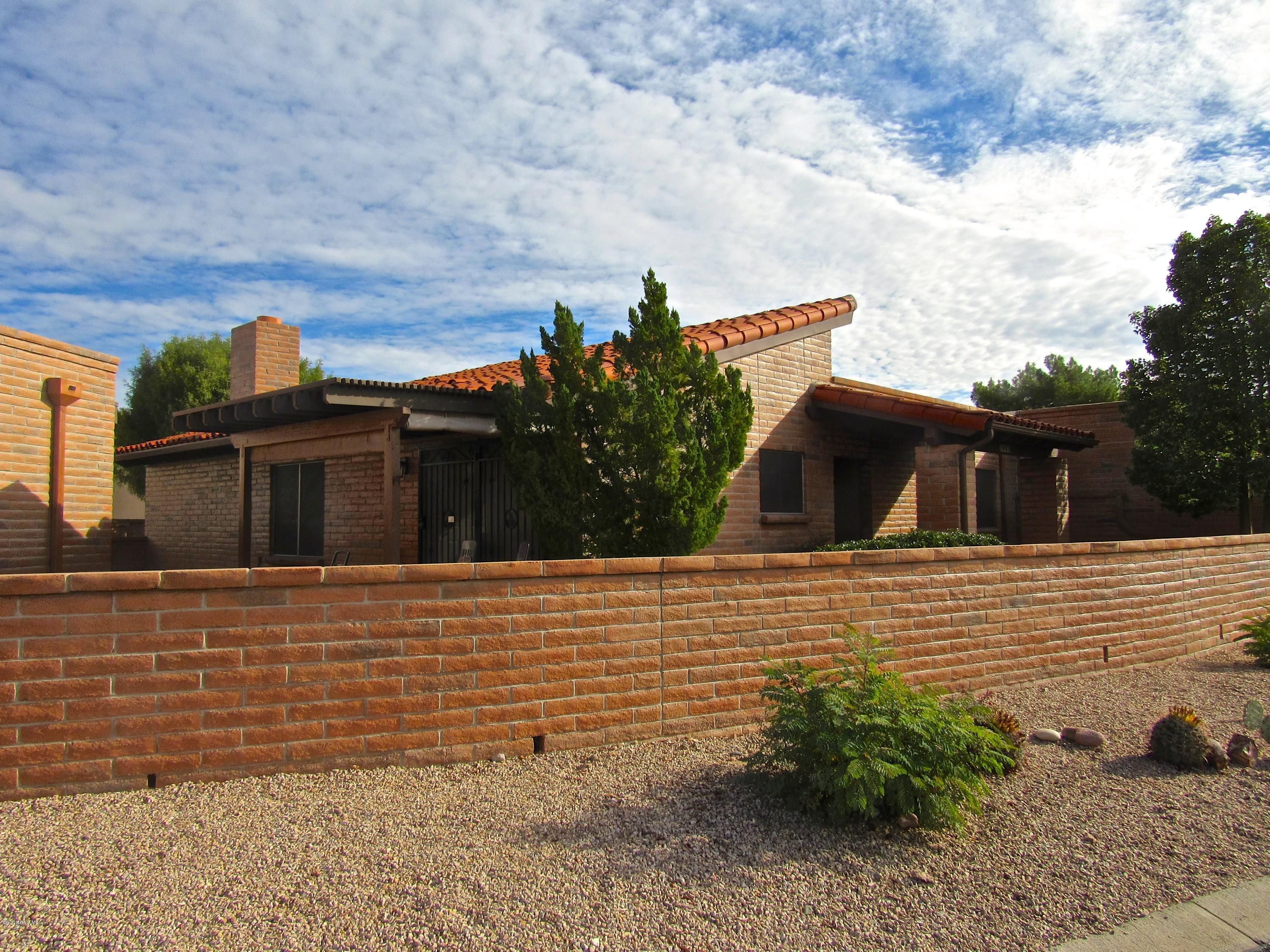 Live the AZ lifestyle! Come see this light, bright, and airy Senita in popular Desert Hills V. It boasts of 1,700 square feet, great room, two bedrooms, two bathrooms, den (with built-in Murphy bed), beehive fireplace, and spacious eat-in kitchen. The rear yard features a screened AZ room--plus a walled patio that is comfortable and private. Over 100 linear feet at the curb allows for distinct placement of the two-car garage. The property is conveniently located near golf and GVR facilities.