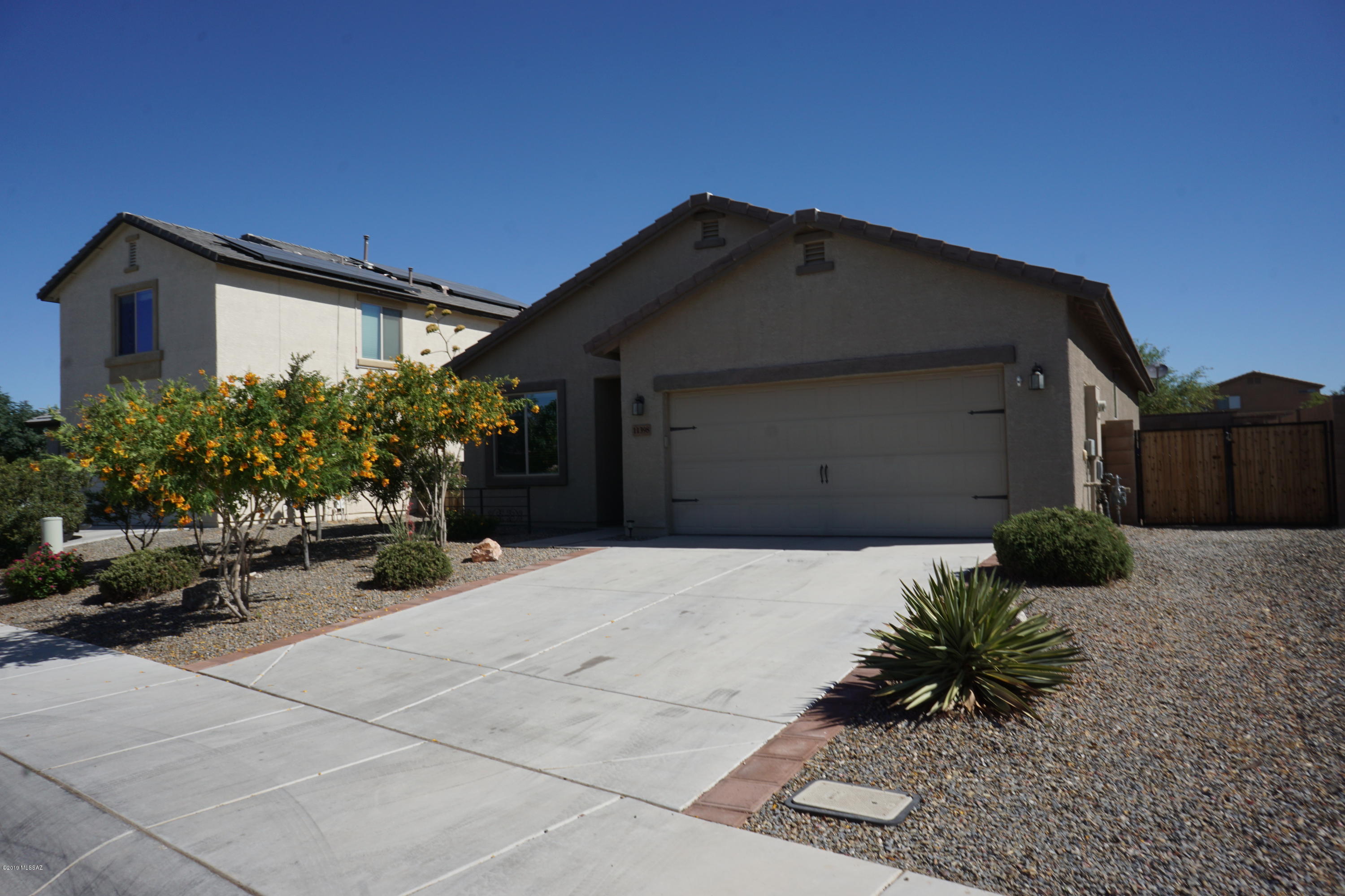 Beautiful 3Bedroom 2Bath home in Marana.  Home features ceiling fans, 18'' ceramic tile, neutral colors, gas or electric dryer hookup, beautiful landscape front and back and more.