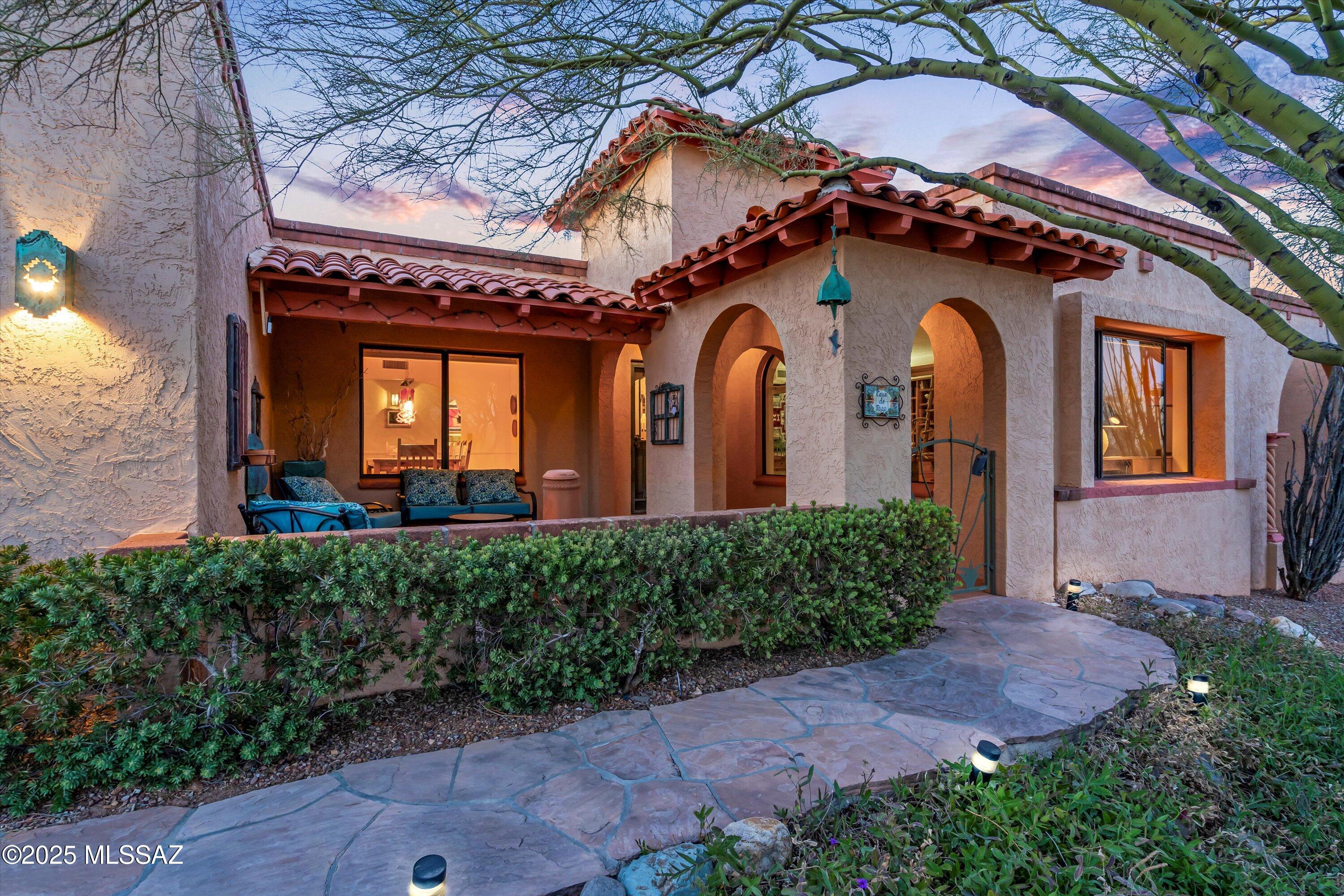 Experience Foothills living in this desirable 4-bedroom, 2.5 bath home, on a .54 acre elevated lot backing to open space. Designed to capture the sunset and mountain views, this 2,609 sq.ft. home offers a well-planned split bedroom layout for privacy & comfort. The spacious kitchen opens to a family room, while an additional living room provides flexibility as a home office or den.  Step outside to your private backyard oasis, complete with a sparkling pool and spa, where you can unwind while taking in the stunning desert landscape. Recent improvements include an inviting remodeled bath & new flooring in the primary suite. The driveway was chip-sealed for a fresh, maintained look. Don't miss the bonus office/craft room off the laundry area. Ring camera system will be active when showing. HOA fees are $115 per month, and they include trash and recycle pick up once a week, and road maintenance. Access to the community pool is an additional $70 per month - this is optional!
