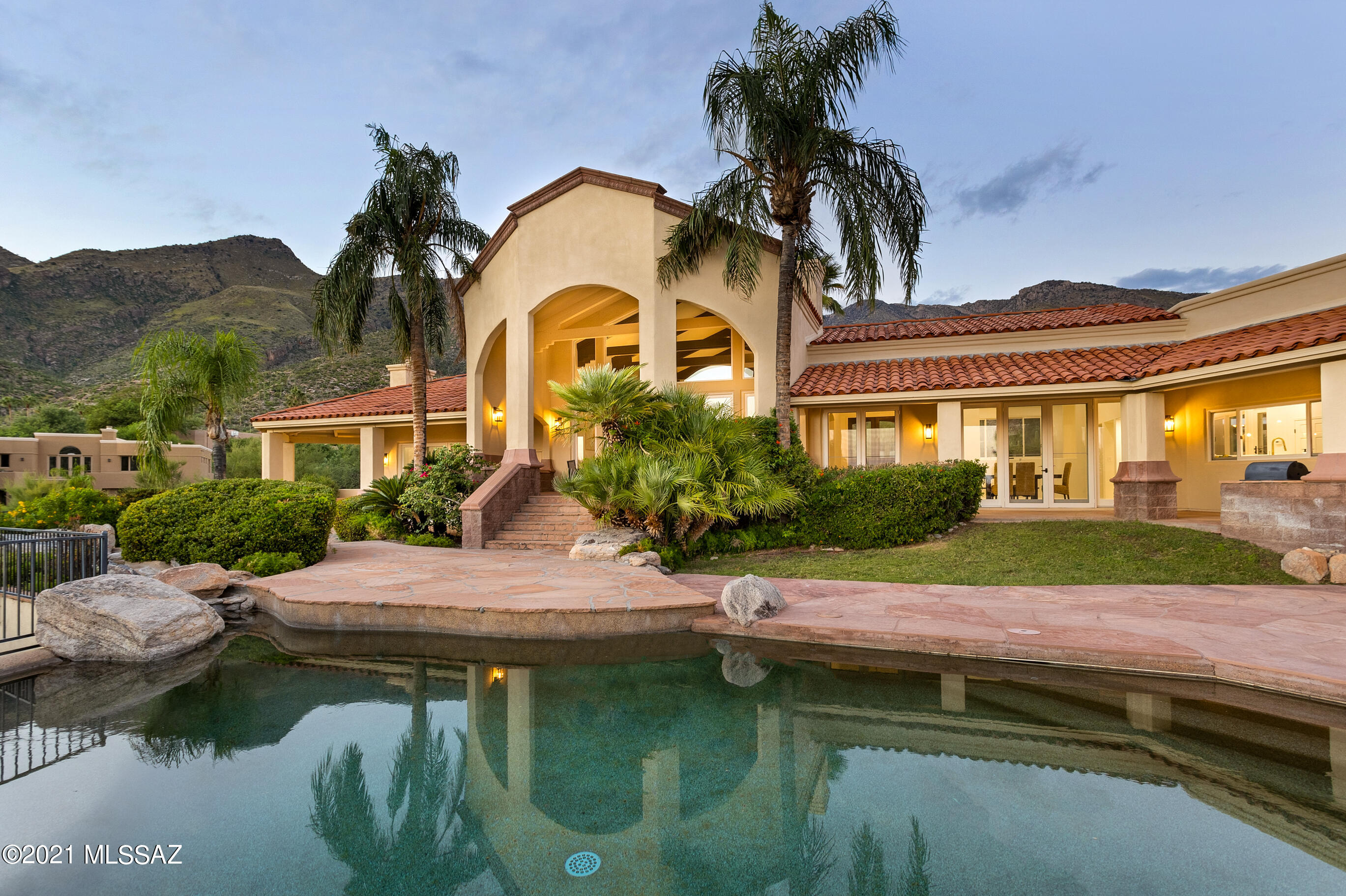 Set in the exclusive guard gated community of Finisterra. Perfectly situated to maximize city and mountain views while seamlessly blending into an acre+ hillside lot, this stunning property with 3 beds/3 baths plus a den truly has it all. The beautiful open kitchen with custom quartz countertops and forever views will beg you to stay. As you enter the living room you'll be left breathless at the site of the mountains. Imagine sipping a glass of wine from the wet bar and spending an evening simply staring at nature's beauty. The owner's suite complete with sitting area, city views, and exquisite bathroom will have you never wanting to leave. The pool, spa, and city lights from the backyard will seal the deal. Come experience this truly special property today before it's gone.