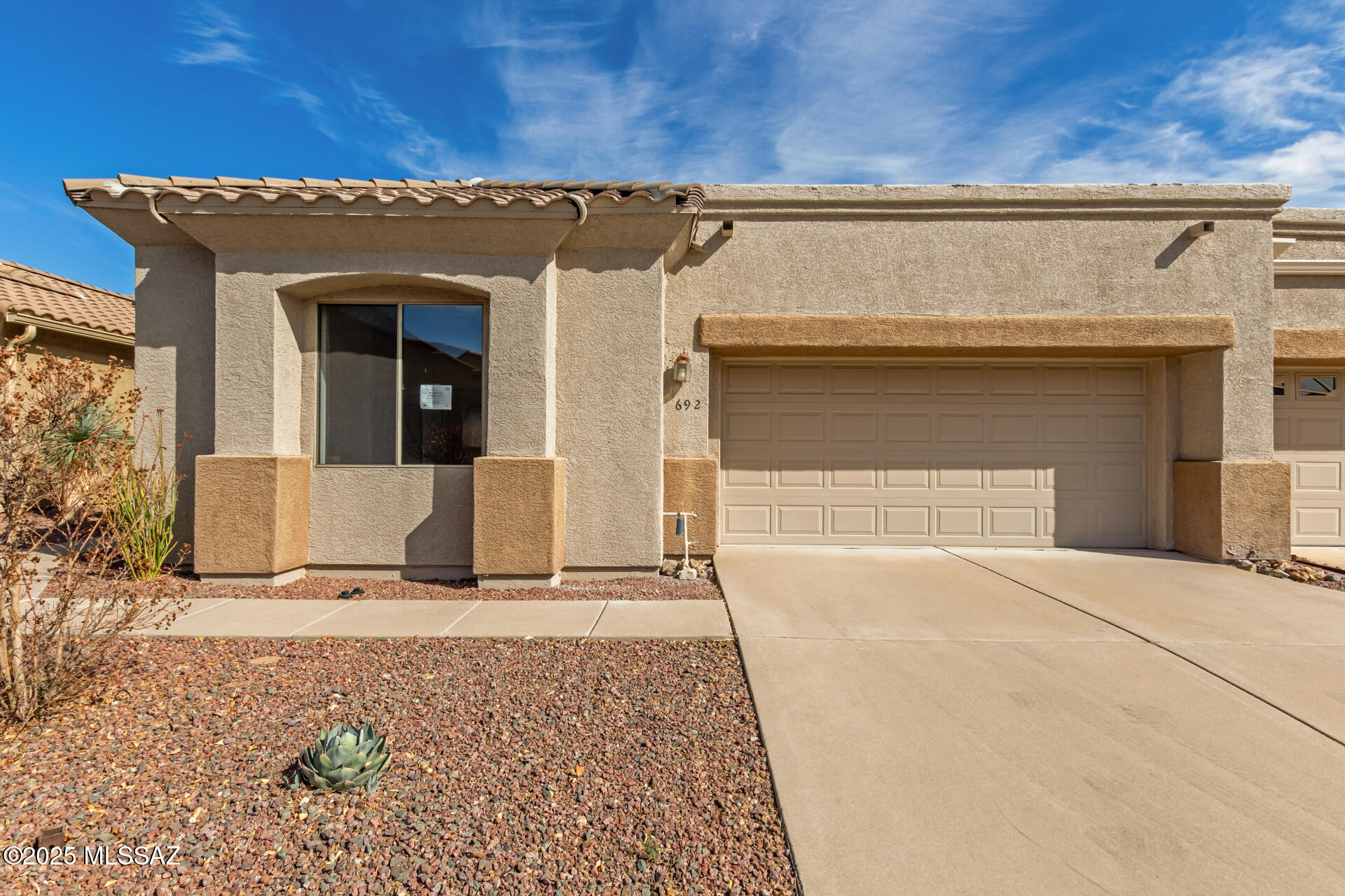Now available! Move in ready  Contemporary style town home featuring 2 bedrooms and 2 bathrooms.  Refreshed with new carpet, paint, stainless steel appliances and more. Enjoy the covered patio and  private landscaped back yard. Abundant amenities available through the Green Valley Recreation membership. A must see!