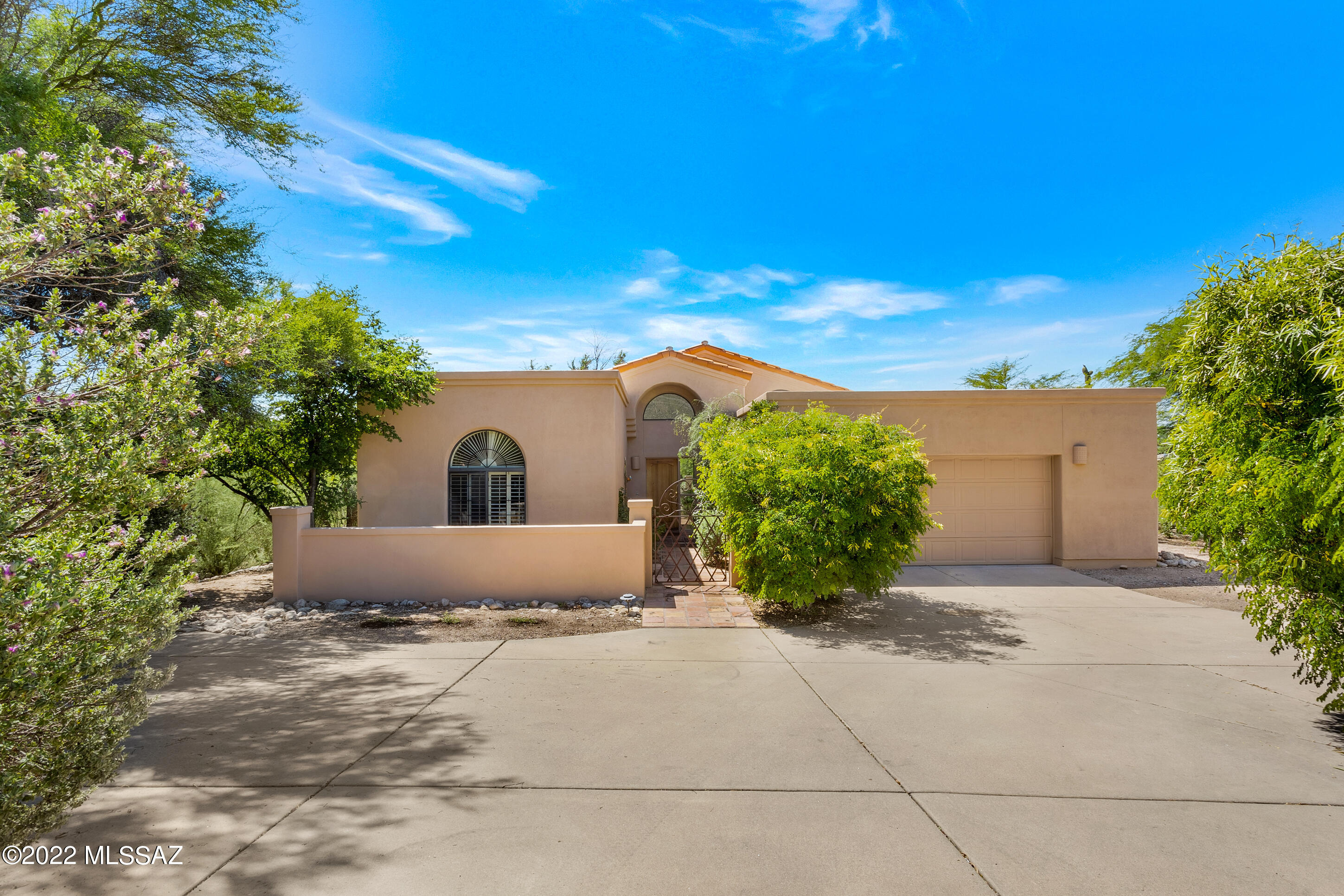 La Paloma beauty on a large quarter acre golf course lot with PRIVACY & VIEWS for this one owner home! This lovely 3 bedroom, 2.5 bath home is a rarity in always sought after Vista Serena. Private on both sides & beautiful city, mountain and, of course, those amazing golf course views!!! LOCATION, LOCATION, LOCATION. Light, bright & airy with great use of space & the perfect entertaining home! The living room has high beamed & dramatic ceilings - again perfect for entertaining. From the kitchen there's a wonderful view of the second tee plus a wall of cabinetry with amazing storage. The charming family room off the kitchen leads to the covered patio & the spacious & GREEN back yard with more of those spectacular views! Two primary suites & lots & lots of storage. Lovely mature vegetation!