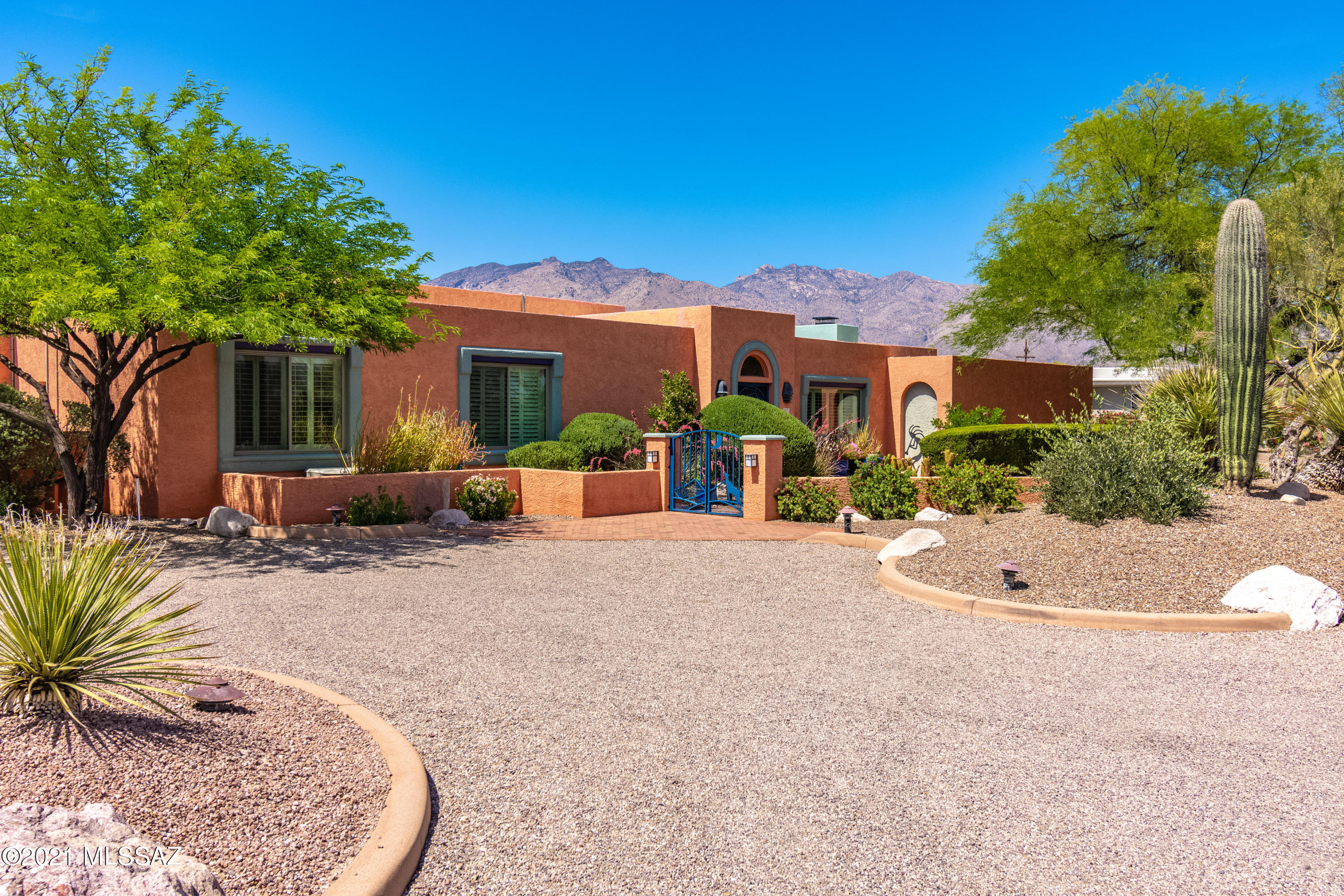 This Catalina Foothills home has been meticulously maintained and upgraded by the current owners. Enjoy over 3000 sq ft in this 3 bedroom single-level home, with generous living, dining, kitchen and family rooms. There is tile or wood flooring throughout for easy maintenance. The rear patio has multiple covered areas with a low-care yard to enjoy the mountain views from. The 4-car garage (with mini-splits to heat/cool) will accommodate both car enthusiasts or give plenty of hobby/workshop space. Lots of guest parking is available as well. Some of the recent upgrades and additions that have been made include 5KW solar system, all new Low-E windows throughout, 2 newer HVAC systems, new recirculating water heater, a new central vacuum system, and more.