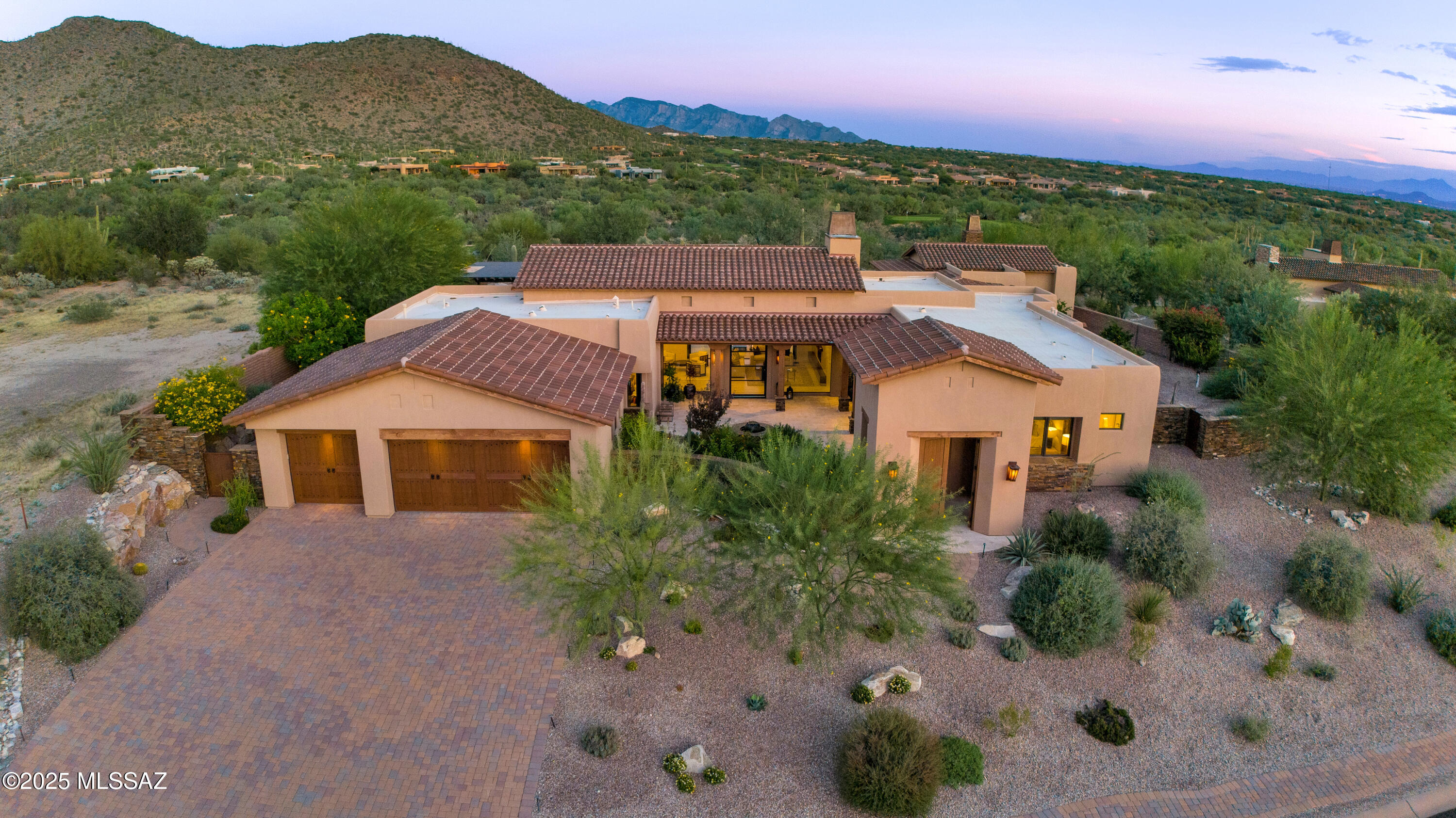 Experience refined desert living at The Ritz-Carlton Residences, Dove Mountain. Set on a spacious homesite with stunning panoramic views, this thoughtfully designed residence embodies sophisticated desert contemporary style. 

The impressive main house offers three spacious ensuite bedrooms plus a den. The open layout showcases elegant architectural lines, refined finishes, and seamless indoor-outdoor living. 
A separate guest casita with bedroom & living area is perfect for visitors. 

Outside, the resort-style backyard features a sparkling pool, an entertainer's gazebo, outdoor kitchen, and breathtaking desert and mountain views that define true Arizona luxury living. Owners enjoy access to The Ritz-Carlton Resort, amenities, concierge services, social events and more. This exceptional property offers an unparalleled opportunity to live within one of Arizona's most prestigious resort communities. 

View Website Here:https://listings.kccreativedesign.com/6139-W-Seven-Saguaros-Cir-Marana-AZ-85658-USA