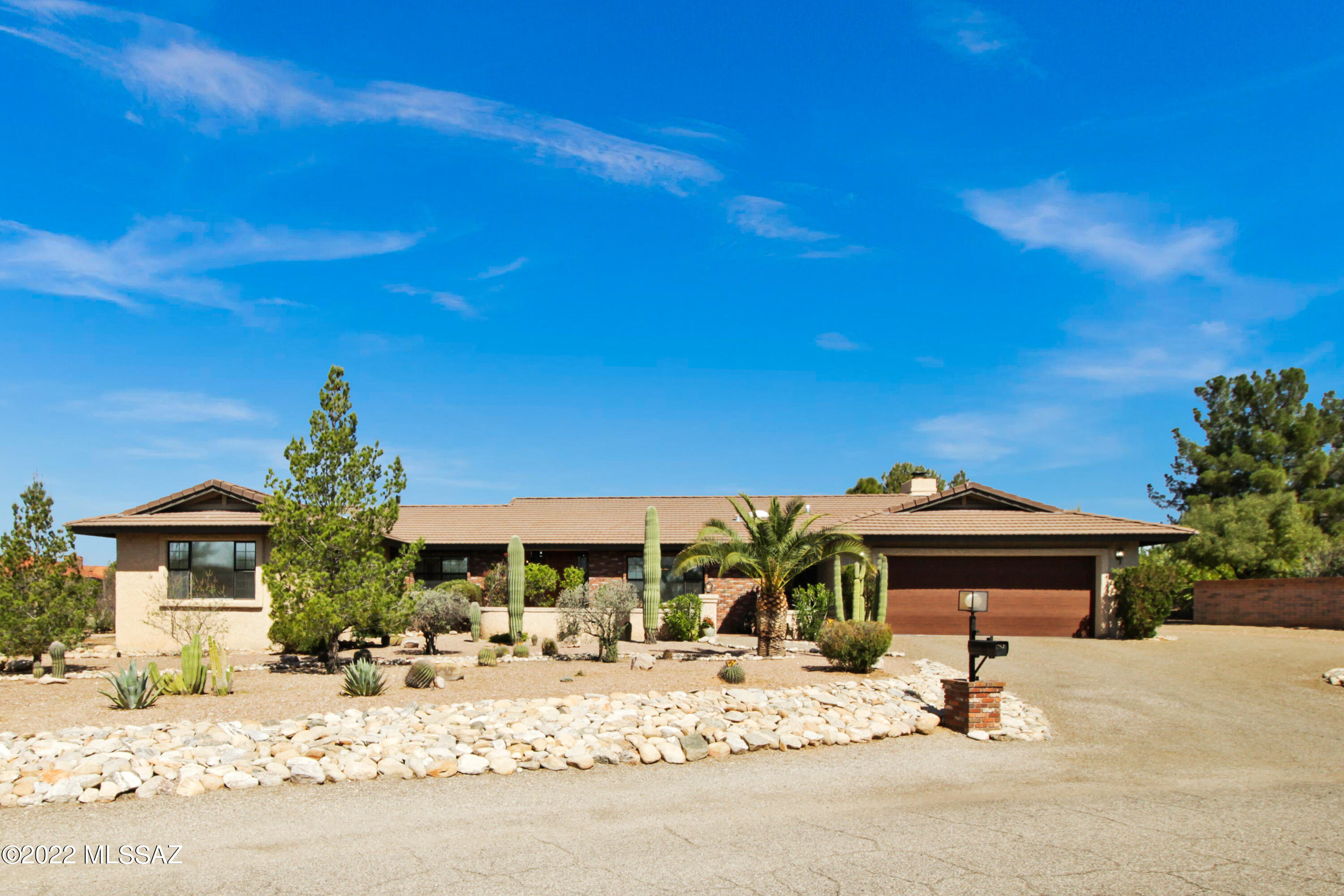 Now Live! Catalina Foothills School District Corner Lot Charmer! Foothills living. This home has been immaculately cared for by the homeowners for many years. Skylights! Fireplaces. New cabinets, new appliances in the kitchen have been added since they purchased. All previous flooring has been removed, replaced with natural stone and engineered wood. Enjoy the pleasure of a water softener for hot water, with new faucets at each sink. HVAC serviced regularly. HWHs have been replaced and also drained and flushed regularly. Garage door replaced. Irrigation system. Trees and fenced yard. Transferable termite warranty. New windows at the front of the home to be installed April. Central vac. Extra storage room off garage, make sure you don't miss it! Buyer verify all facts+figs incl those in MLS