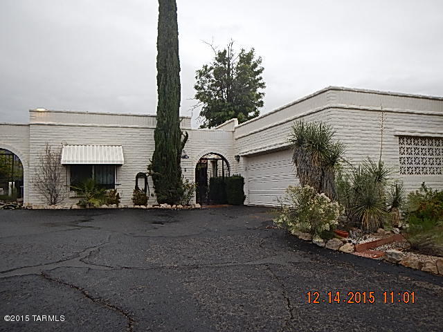 LOCATION-LOCATION-LOCATION! Charming Foothills home! Spectacular Mountain views with wrap around patio overlooking pool area. Lots of privacy and space here. 4th bedroom could be in-law suite or office with private entrance. Roof is in poor condition and is in need of repair/replacement. Lots of potential here! Don't miss this one! Won't last long.Property sold as is with no warranties implied or expressed. No CLUE report or SPDS available from Seller.