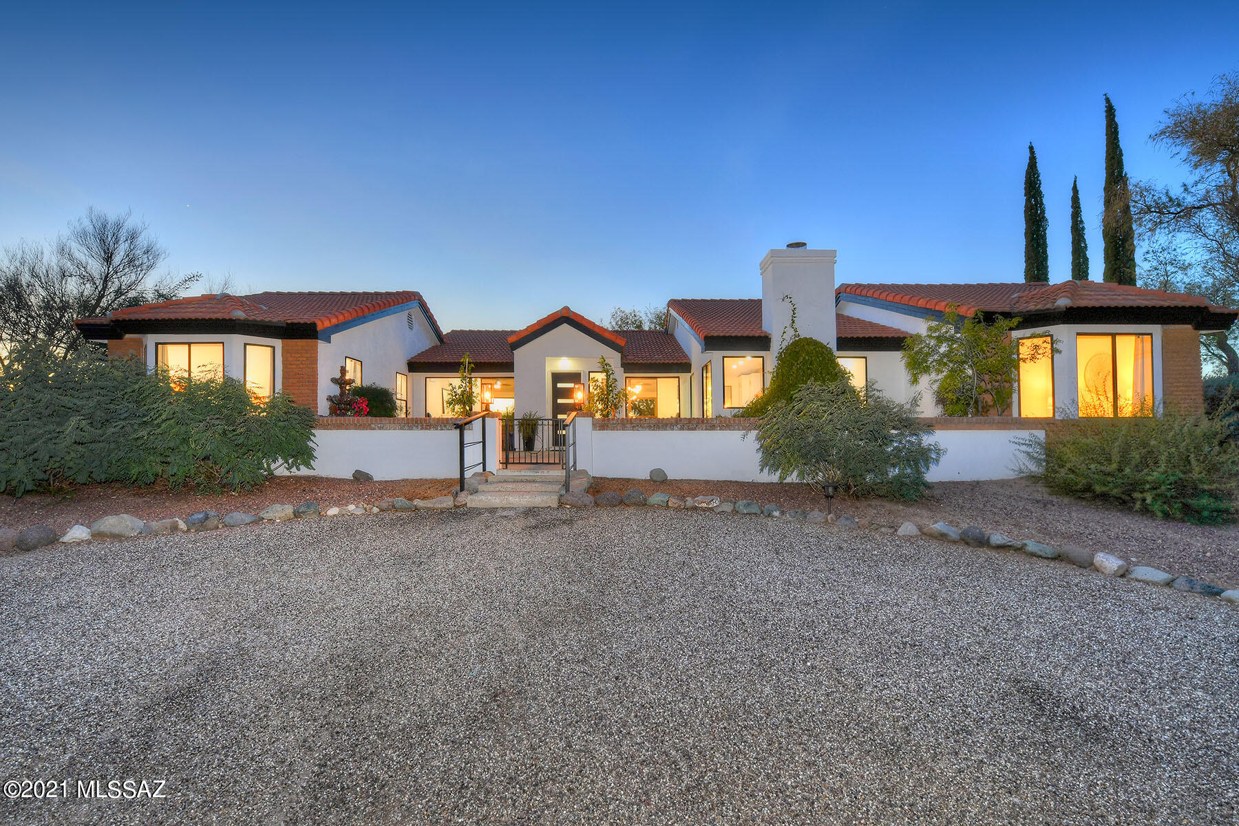 Absolutely gorgeous custom hm on elevated 1.19 AC lot w/ unbeatable privacy & views! Fully remodeled in '21, this hm showcases chef's dream kitchen w/ massive island, 6 burner gas range, pot filler, wine fridge & endless storage. Enjoy resort style mstr suite boasting a wet room w/ dual rain heads & soaking tub, thick cut marble double vanity & huge walk-in closet. Vaulted ceilings & oversized windows let you experience mountains' changing colors & breathtaking sunrises/sunsets. Family rm offers built-in bookshelves & cozy gas f/p. Bdrm 2 acts as second master w/ stunning Catalina views & attached bath. Spacious bdrm 3 & oversized 2 car garage w/ large storage rm complete the main house. Addition has two bonus rms, one w/ its own exterior entry door. Perfect office & gy Addition could be used as additional guest area. Outdoor activities are plentiful with the extensive covered patio, natural gas BBQ, hot tub, firepit and sizable lawn. Plenty of room for a future pool! This home is incredible!