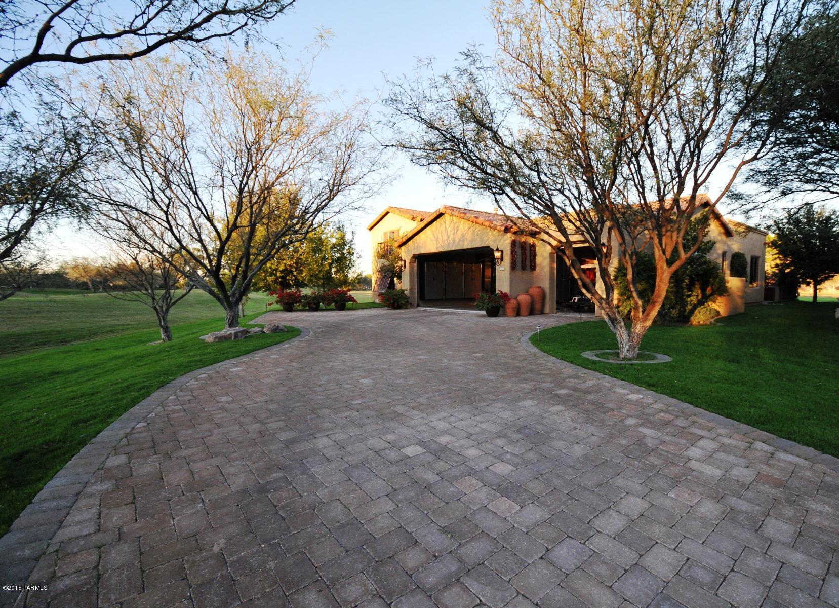 Stunning mountain and golf course views surround this expanded (2560 sq/ft) Dorn Sabino Model with detached Casita located on a large end of cul-de-sac lot within the Tubac Golf Resort. Custom lighting, finishes and high end upgrades throughout. Viking appliances, sitting/office area off master bedroom and jetted tub in master bath. Large front court yard and rear covered patio areas (with electric rolling shade screens), mature landscape front and rear. HOA maintained front landscape. Must see