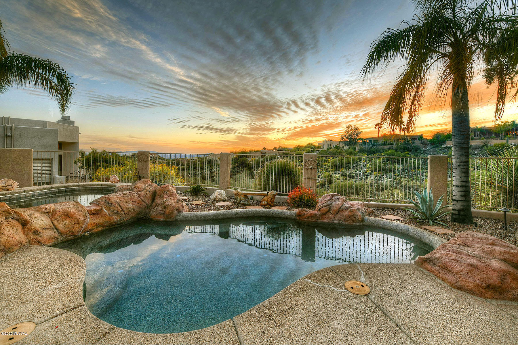 Fantastic 4 Bedroom & 3 Bathroom (or 3BR & 3BA w/ Office) Alta Vista Home w/ Commanding Mountain & City Views. Perched High on a Ridge, This Well Maintained Home Features a Charming Courtyard Entry w/ Fountain, Open ~ Easy Flowing Floor Plan w/ Formal Living & Dining Areas, Island Kitchen w/ Stainless Appliances Opening to Breakfast Area & Great Room w/ Fireplace and Oversized Windows Looking Toward The City & Mountains. Spacious Master Suite w/ Fireplace, Spa Like Bathroom, & Walk in Closet. Wood Paneled Office/Den Could Be 4th Bedroom. Spacious Laundry Room w/ Sink. 3 Car Garage. Private Resort Like Outdoor Living Space Features a Sparkling Pool & Spa, Built In BBQ w/ Covered Dining Area, Gas Fireplace, & City, Mountain, & Sunset Views!