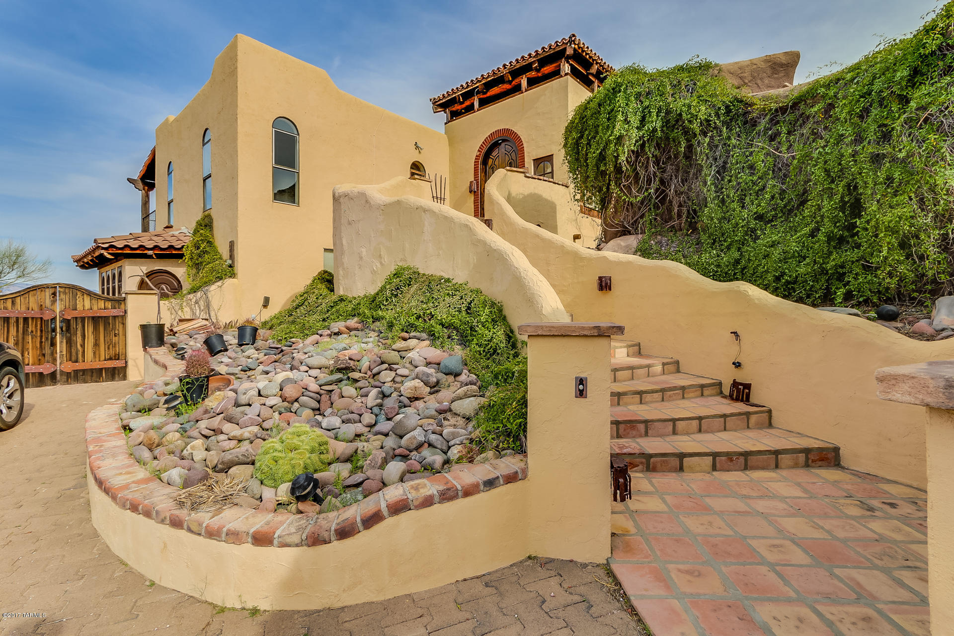 Perched high upon a hilltop with magnificent 360Âº views of the desert, mountains and city, this 3 BD, 3 BA home is a true gem in the Old Pueblo. Enjoy the amazing views while sitting in your wrap around patio. Newly updated kitchen features new cabinetry, quartz counter tops and stainless steel appliances. A one of kind home that must be seen.
