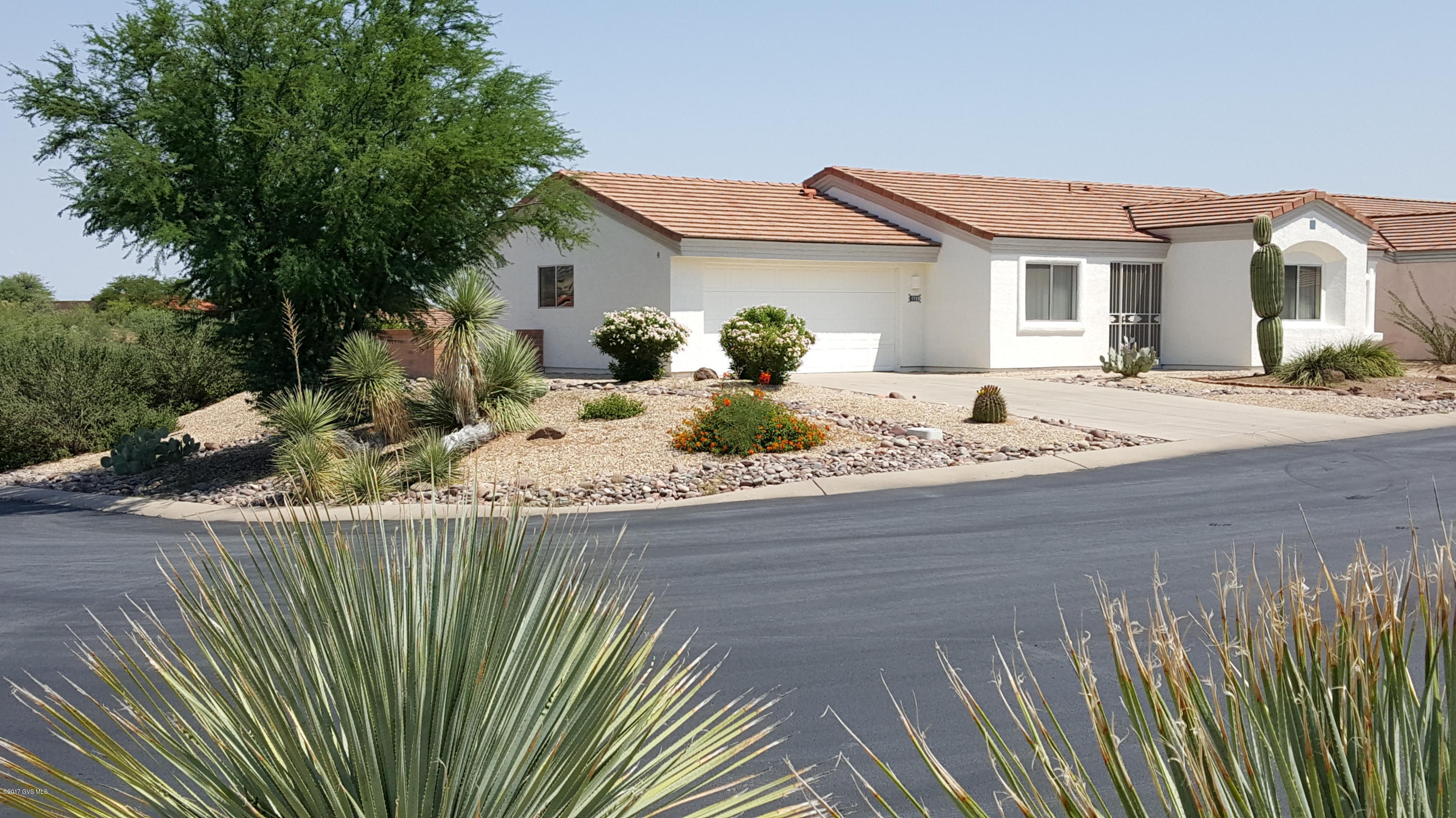 Great corner lot location with some north east mountain views compliment this free standing home in San Ignacio Heights. All southwest tiled floors through out with great storage . A 2 bed & 2 bath home with new washer and dryer , water softener and new roof in 2016