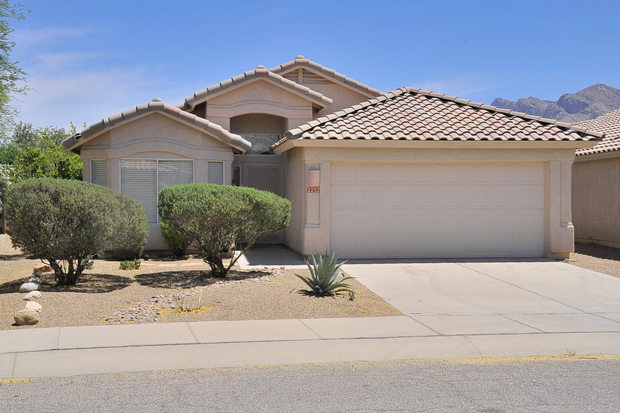 This is a lovely home located in a fantastic community. Everything you need is close by...shopping, restaurants, medical, schools.  Step through the front door to a very open floor plan with lots of natural light and tile floors throughout the living areas.  New paint and carpet make this move in ready.  A beautiful, peaceful backyard offers privacy and views!