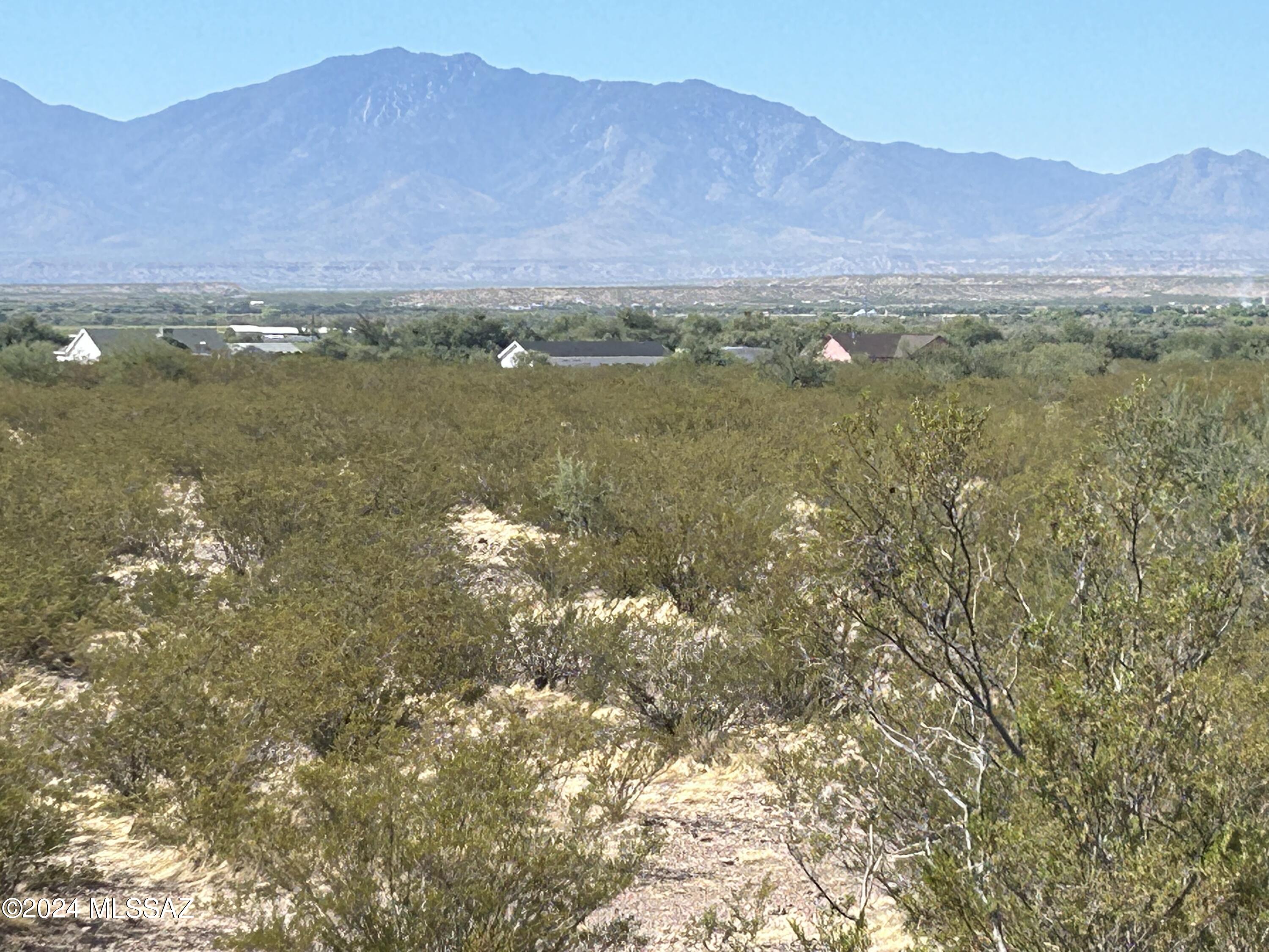 Discover the prefect spot for your dream home or getaway retreat on this spacious 1-acre lot in the serene beauty of southeastern Arizona.  With 360-degree panoramic views of stunning desert landscapes and mountain ranges, this property offers peace and privacy, along with room to spread out.  Enjoy breathtaking sunsets and peaceful starry nights in a tranquil rural setting, yet with city water already available on the lot.  Escape the hustle of city life and embrace the beauty and quiet of nature, all while staying close to essential amenities.  Don't miss this opportunity to create your own oasis in one of Arizona's most scenic regions!