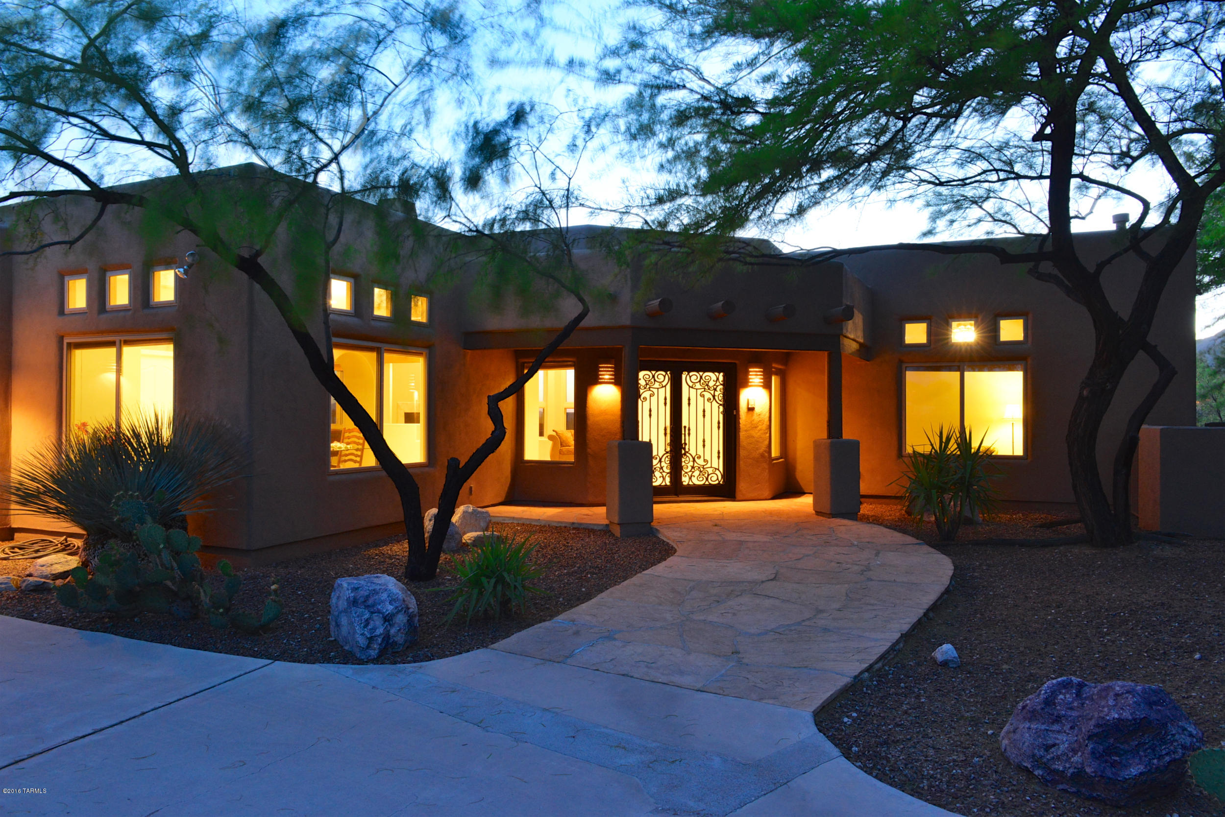 Stunning foothills executive home.  Gorgeous mountain views as well as stunning City lights. 5 bedrooms, 3 full baths.  Use one bedroom as a fantastic office. Great split floor plan.  

Seller redid kitchen through Kitchen Concepts 3 years ago. Absolutely stunning. High-quality Viking appliances throughout. It even includes a wine refrigerator.  

Wonderful entertaining area overlooking the pool and spa with an expansive view of the Catalina Mountains that is totally unobstructed.  

Living Room with wall-of-windows viewing the mountains & City lights and cozy fireplace. Family room with cozy  fireplace. Formal and informal dining.

Oversized 3-car garage with loads of storage cabinets.  

HVAC system and all windows were replaced 3-4 years ago.  What a bonus