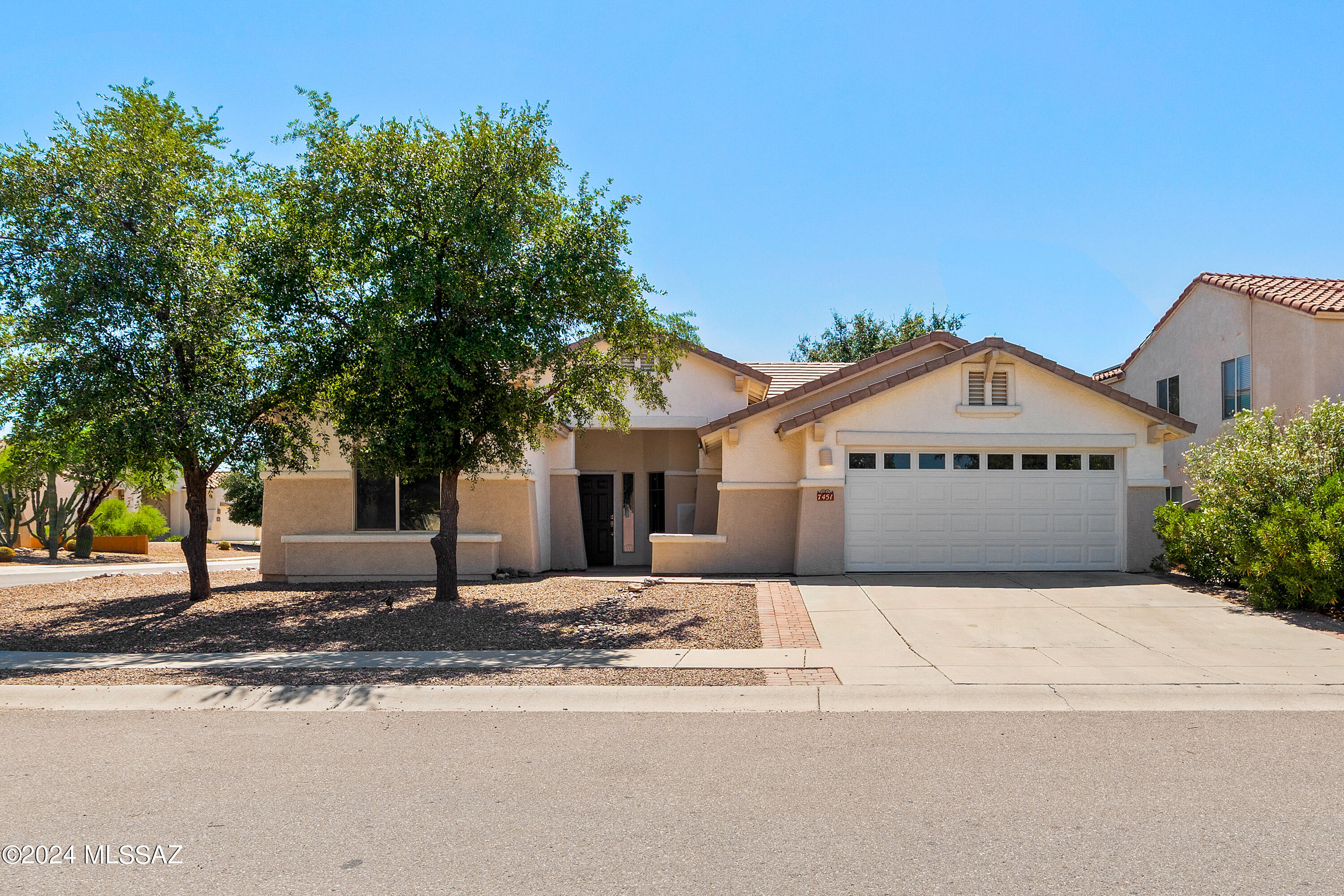 *Seller to pay off solar loan w/ full price offer* This stunning home on Tucson's NW side offers the perfect blend of style and convenience. Just 5 minutes from the freeway, the location ensures easy access to everything the city has to offer. As you step inside, you're greeted by a moody palette that sets a sophisticated and cozy atmosphere throughout the home. The thoughtfully updated kitchen is the heart of this residence, featuring modern finishes and ample space for both cooking and entertaining. The split-bedroom floor plan provides privacy and comfort making it ideal for families or hosting guests. Situated on a desirable corner lot, the property boasts low-care landscaping in both the front and back yards, offering a peaceful retreat with minimal upkeep.