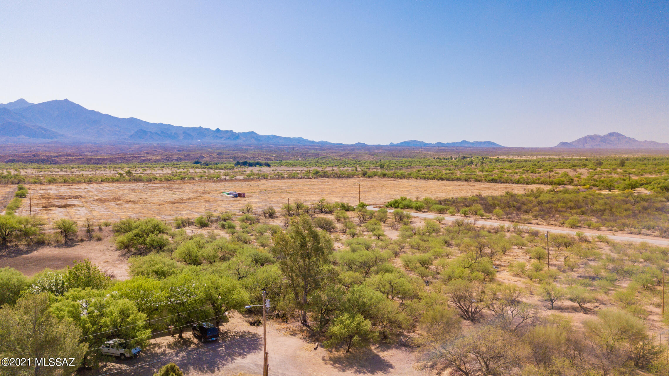 Well located parcel of land zoned for Business and including Irrigation Grandfathered water rights!  With  72 acres of Irrigated land and a well that produces over 1000 gpm this property is perfect for a farm/commercial operation. The farm has a certificate of GFWR for an annual allotment of 336.34 ac/ft. The property is situated adjacent to I-19 frontage road with paved access directly to the frontage road.   Located in Santa Cruz County ,the current Owners have a variance/permit to operate a Marajuana growing facility! Very rare opportunity!