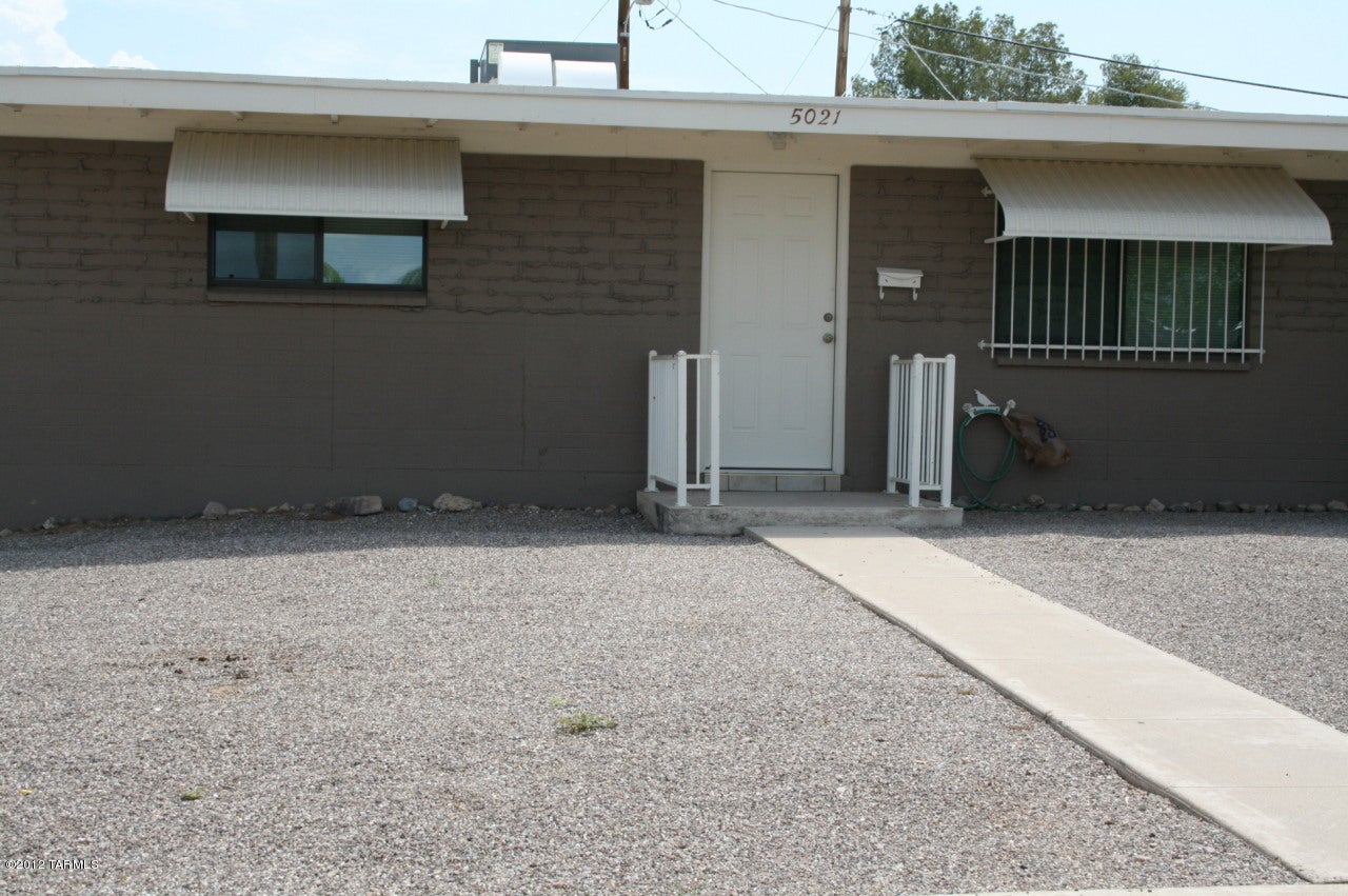 Beautifully remodeled, charming end unit with private backyard.