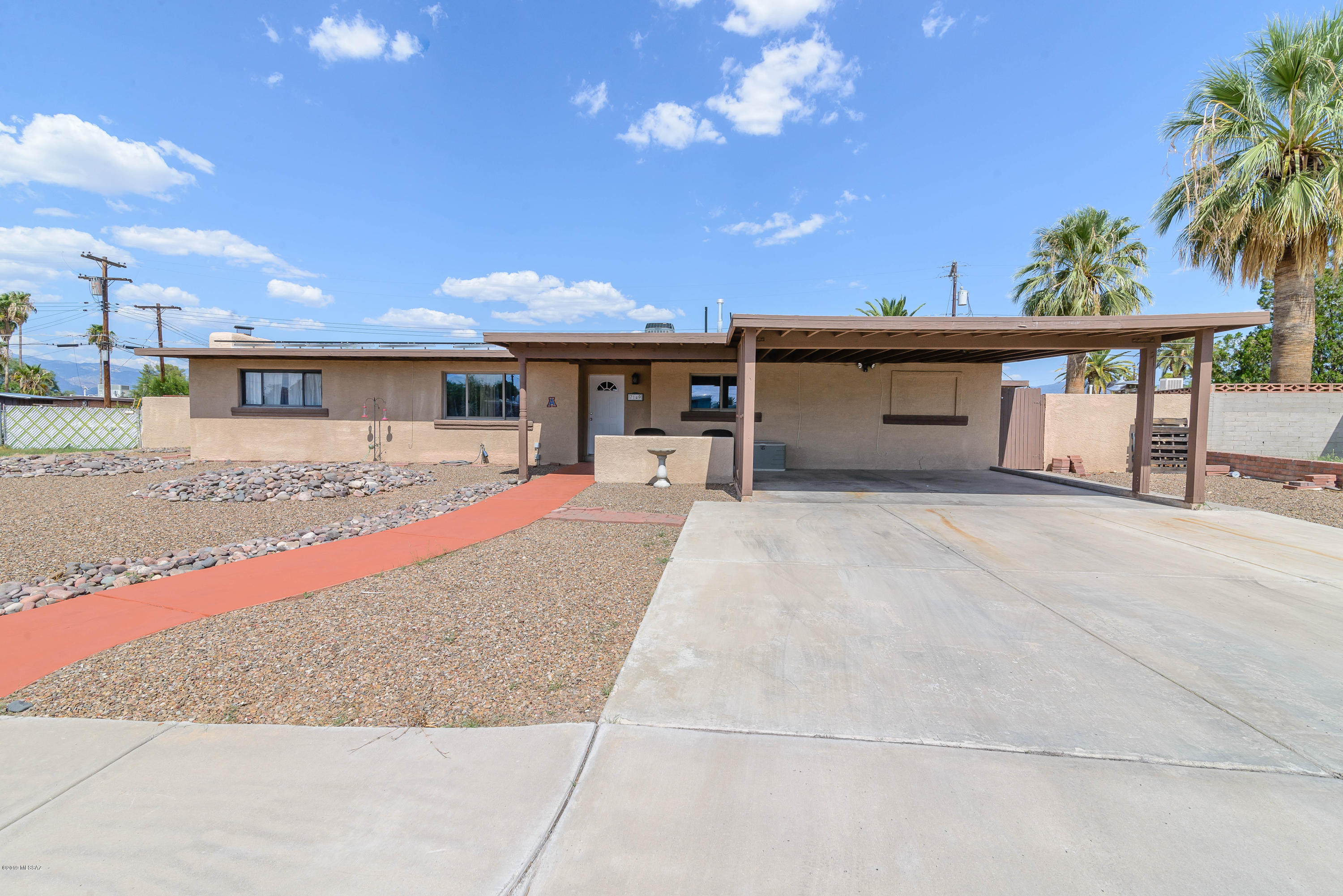 Beautiful 3 bedroom home with sparkling pool and already landscaped backyard! This home has dual pane windows, recessed lighting, crown molding, ceiling fans and laminate wood floors throughout. Cozy fireplace in living room & great open floor plan. Kitchen features granite counter tops, lots of cabinets, breakfast bar, center island and SS appliances. You will love the huge Master bedroom and walk in closet! Master bath features walk-in, tiled shower. Hallway bath features dual sinks and tub/shower. Stunning backyard features a huge covered patio, block wall, pool and fire pit plus Solar panels, mountain views and privacy at this cul-de-sac lot! Don't miss this beautiful, move-in-ready home!