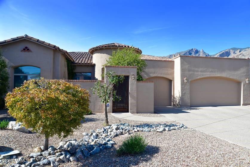Wonderful mountain view premium lot in the desirable gated community of Pinnacle Ridge. Enjoy the wonderful views from a huge backyard with lots of room; pool, built-in BBQ, grass area, half basketball court and a dog run. The interior of the home is superbly upgraded with custom cabinetry, slate flooring, granite countertops, GE monogram stainless steel appliances, and beautiful wood accents. The den, currently used as a library/office, is designed with ceiling to floor built-in bookshelves and desk. The master closets were professionally designed. This home is move-in ready and perfect for the most discerning buyer. Foothills living at its best! House will be back on market around May 15th, once the sellers move  out.