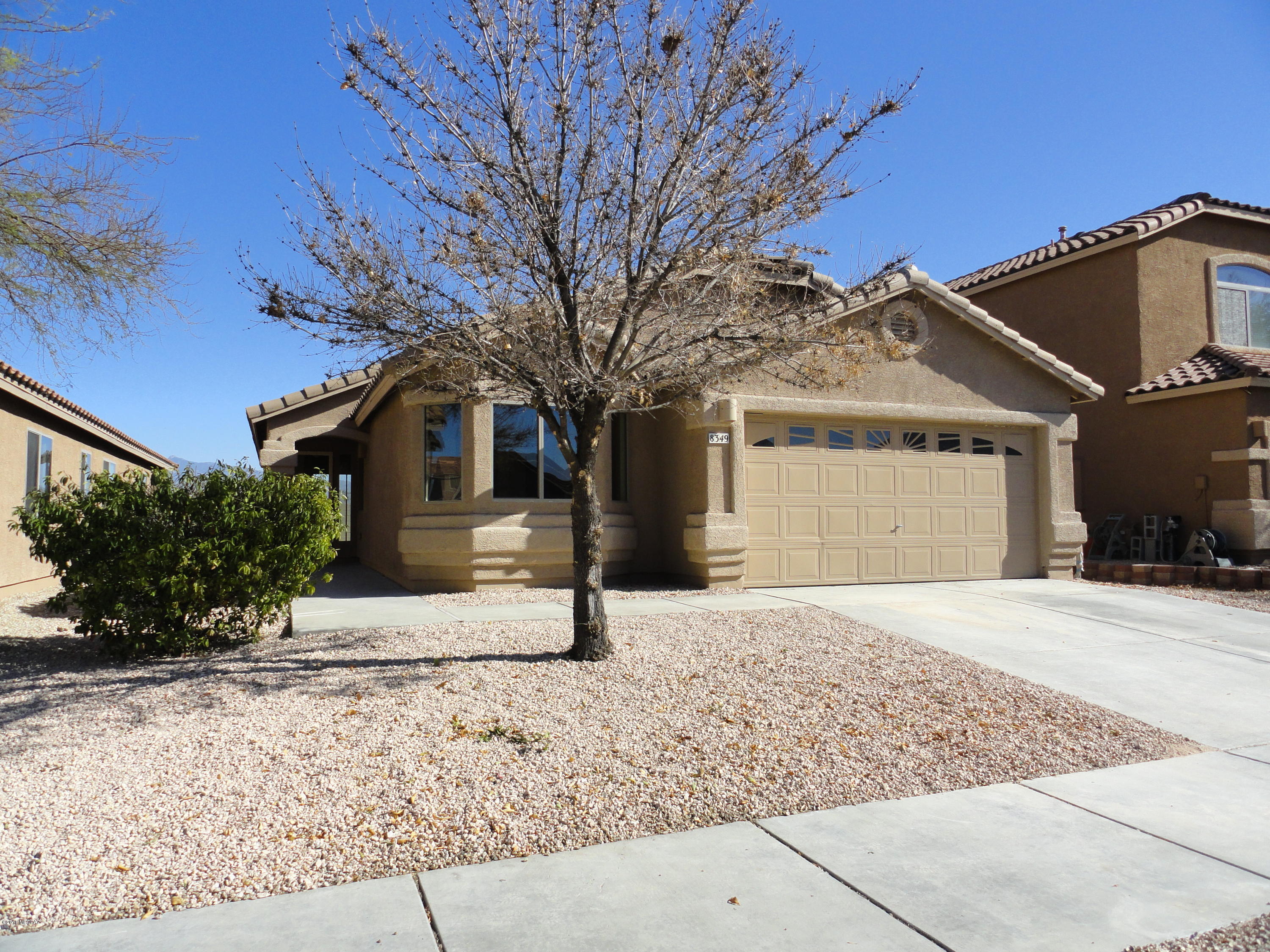 This 4 bedroom/ 2 bath 1554 sf home has an open floorplan with great room style living. Split bedroom, vaulted ceilings, gas fireplace, NEW carpet. All appliances including refrigerator and washer/dryer. Backyard has covered patio and MOUNTAIN VIEWS. Community has a park with playground, barbecue, basketball courts & dog park. Easy access to I-10, Raytheon & DM. Home has been professionally cleaned and is move-in ready!  Sellers are licensed real estate agents in Arizona.