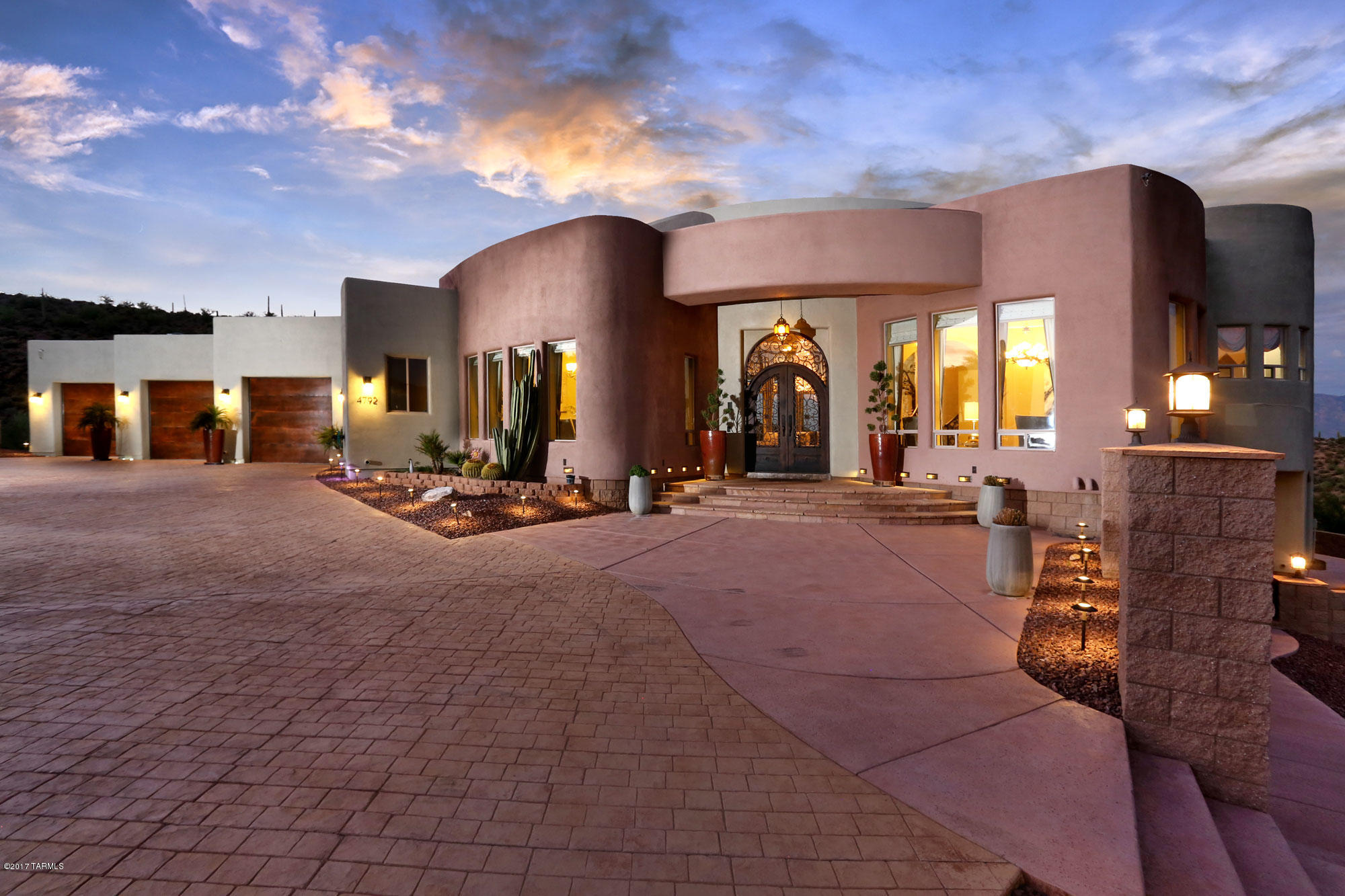 Enter through your private gated driveway and experience 360 degree views of beautiful Tucson and the surrounding mountains from this 3.3 acre estate. Take in the scenery underneath the Spanish ramada while enjoying the outdoor fountain and crystal clear pool. Open floor plan is bright and filled with custom marble flooring and cathedral ceilings. Chefs kitchen features stainless steel appliances and granite counter tops. Plenty of space for RV's and other toys enjoy modern luxury living without the HOA! Call today to schedule your showing. This listing will not last!