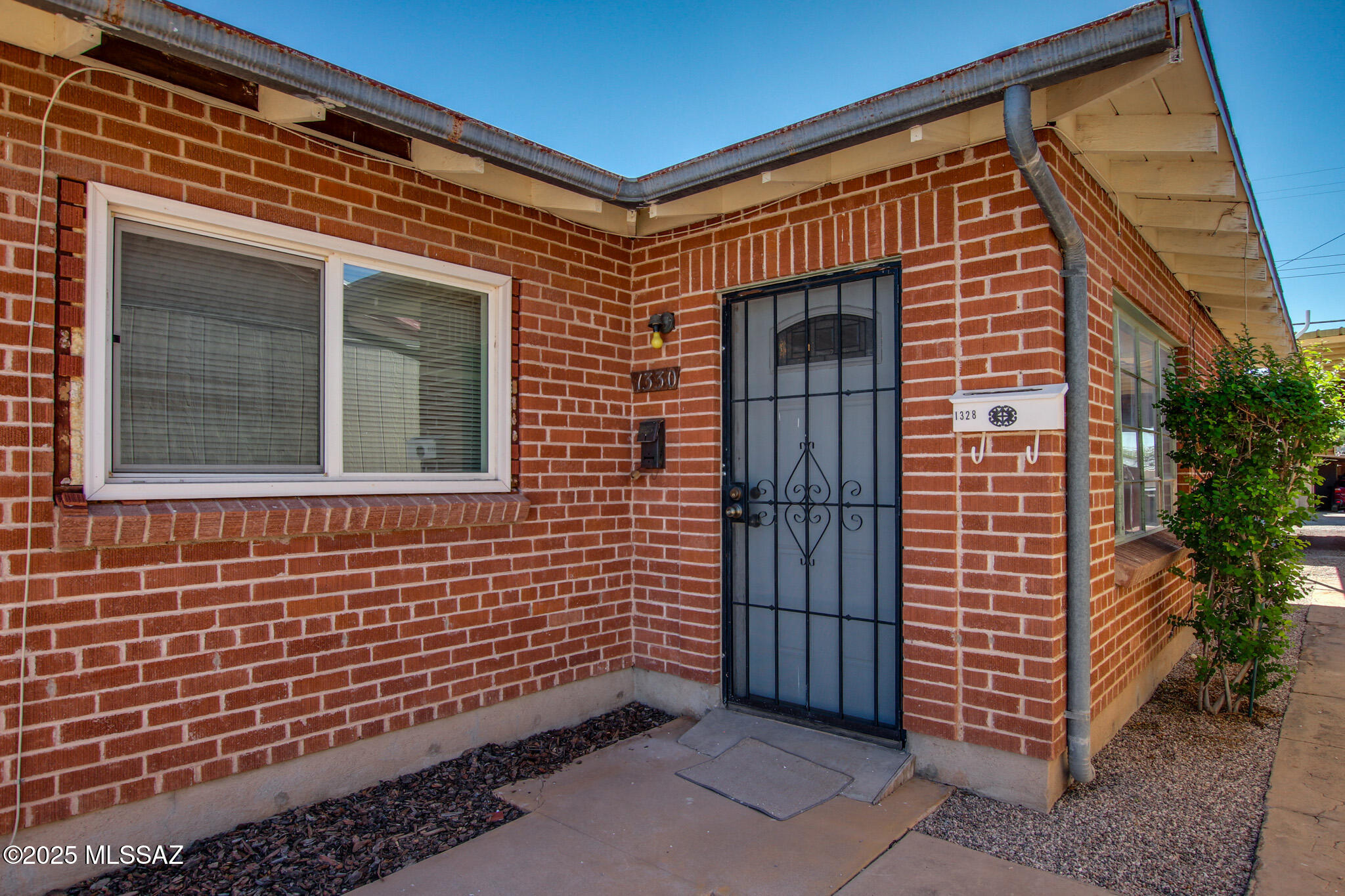 Fantastic Triplex Investment Opportunity minutes from the U of A, Downtown & 4th Ave. This unique multi-unit property offers a 2 bed +1 bath with an attached 1 bed + 1 bath, along with a stand alone studio. The 2/1 recent updates include renovated bathroom, new tile throughout, refrigerator & gas stove. This unit is currently vacant & ready to be rented. The 1/1 is leased through April. The Studio is on a month to month lease. Property is fenced with corrugated metal for privacy off of Broadway. Access to parking is through the back ally off Highland with 5 (possibly 7 depending on size of vehicle) covered parking spaces. Laundry is on property in locked storage room for Tennant Only access. Each unit has it's own separate entrance. The property is a prime location close to U of A... shopping, dining & transit with excellent rental income potential in a high demand area. Don't miss this opportunity to own this Versatile Gem in the heart of Central Tucson!!
The 2 units that are tenant occupied require 48 hour notice to show. This property is MUST SEE! Rents shown for 2/1 are estimated as it is vacant. Rents for 1/1 & studio are actual with current leases.