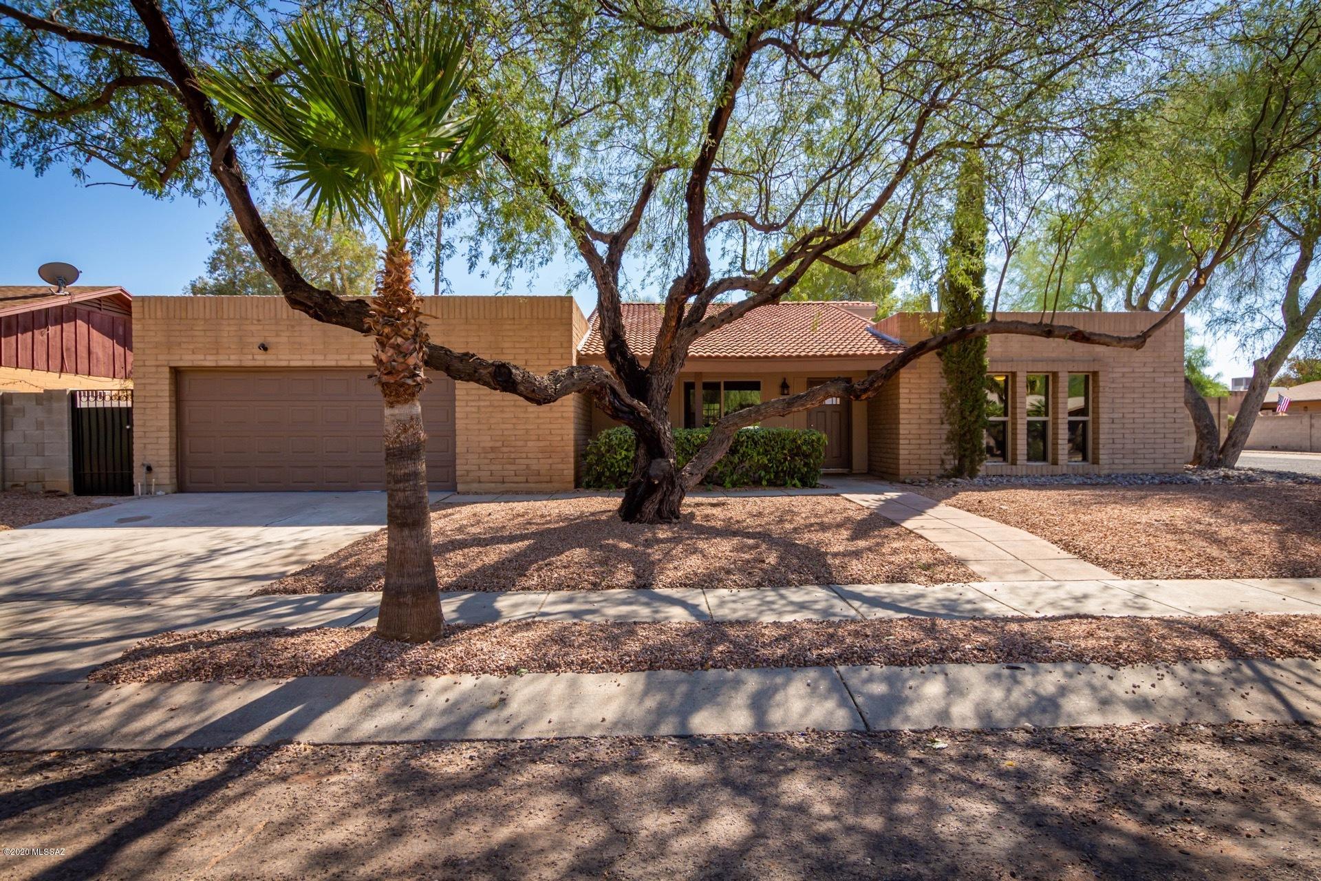 Beautiful & impeccable property located in the Northeast neighborhood of Vista Del Rio. This newly remodeled single family home features 4 bedrooms, 2 bathrooms, extra den/living room with a pool & spa! The large split floor plan features 2,200 square feet, new wood plank tile, new carpet, new paint, all new dual pane windows, inside laundry room and 2 car garage! The brand new kitchen boasts white shaker cabinets, brushed nickel hardware, granite countertops, kitchen island, eat in breakfast nook and new stainless steel appliances (to be installed). The master retreat is split & spacious with an ensuite featuring new dual vanities, walk in shower, private toilet room & walk in closet. The other 3 bedrooms are in the east wing & share the hall bath. All bathrooms have been impeccably updated with new vanity cabinets, new granite countertops, new mirrors, new plumbing fixtures and tile surrounds with deco accents in both showers. The large family room has a wood burning fireplace and provides access to the pool area. The backyard features beautiful landscaping with deco rock, shrubs surrounding the sparkling pool & spa!