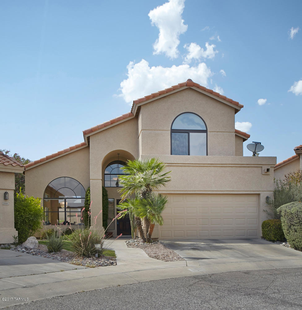 Former model home that has been upgraded with granite counters in the kitchen and new HVAC. 5 bedrooms or 4 bedrooms +Den, adds versatility to this floor plan. Decorator painted walls throughout add to the amenities. Mountain views from the Master Bedroom on the 2nd floor! On a cul-de-sac for minimal traffic and privacy. Fabulous pool and patio in backyard. Don't miss this one! Close to walking path on Tanque Verde Wash! Floor Plan under documents.