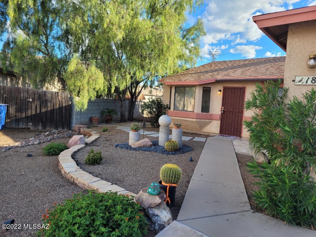 Perfect Midvale Park family home on 12,007 sq. ft. cul de sac lot. Room for a pool, ramada or your own Casita and all your toys. Expansive outdoor living space.with multiple patios, with mature shade and fruit trees.  Covered back patio with ceiling fan spans the entire back of this home. Sit back and relax as you contemplate the endless possibilities. Completely walled, private yard with no neighbor behind. Double drive through gates. Front yard features terraced landscape with water fountain. Formal living room w/ Bay window seat. Light & bright family room off the kitchen  which features pull out cabinet shelves and walk-in pantry. Dual vanity in master bath w/ garden tub &  shower. Beautifully tiled walk-in shower in second bath. New carpet, new paint throughout. Ready for New Family!!